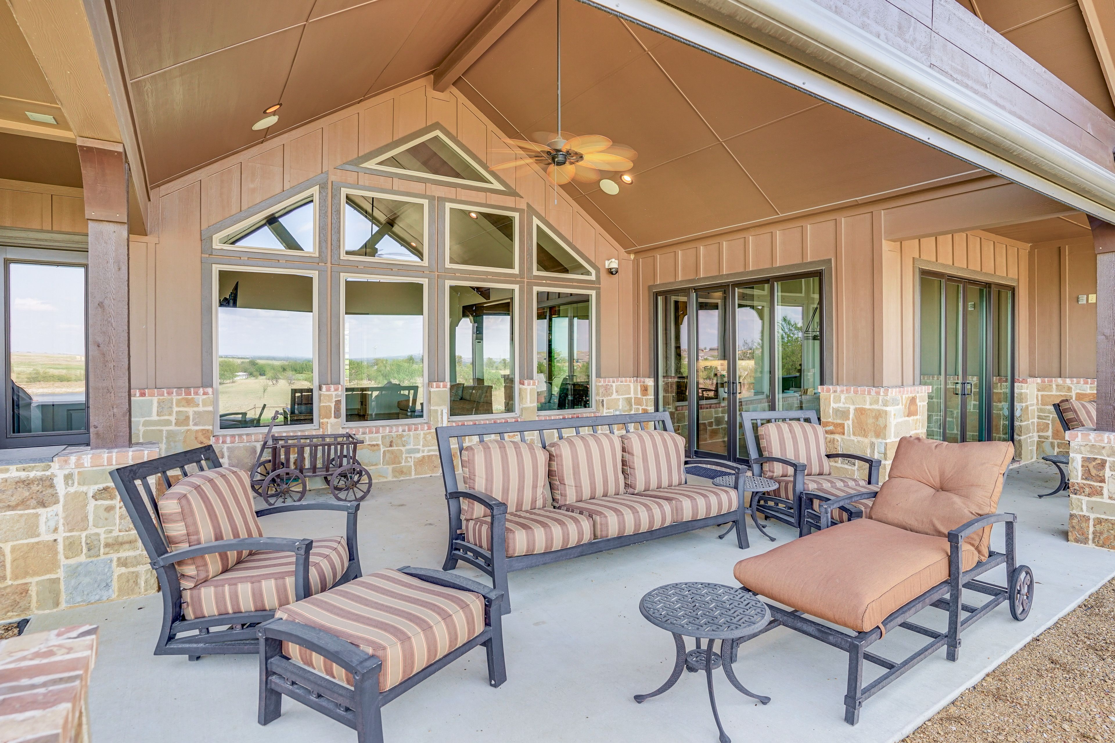 Covered Patio | 23-Acre Yard | Pasture & Sunset Views
