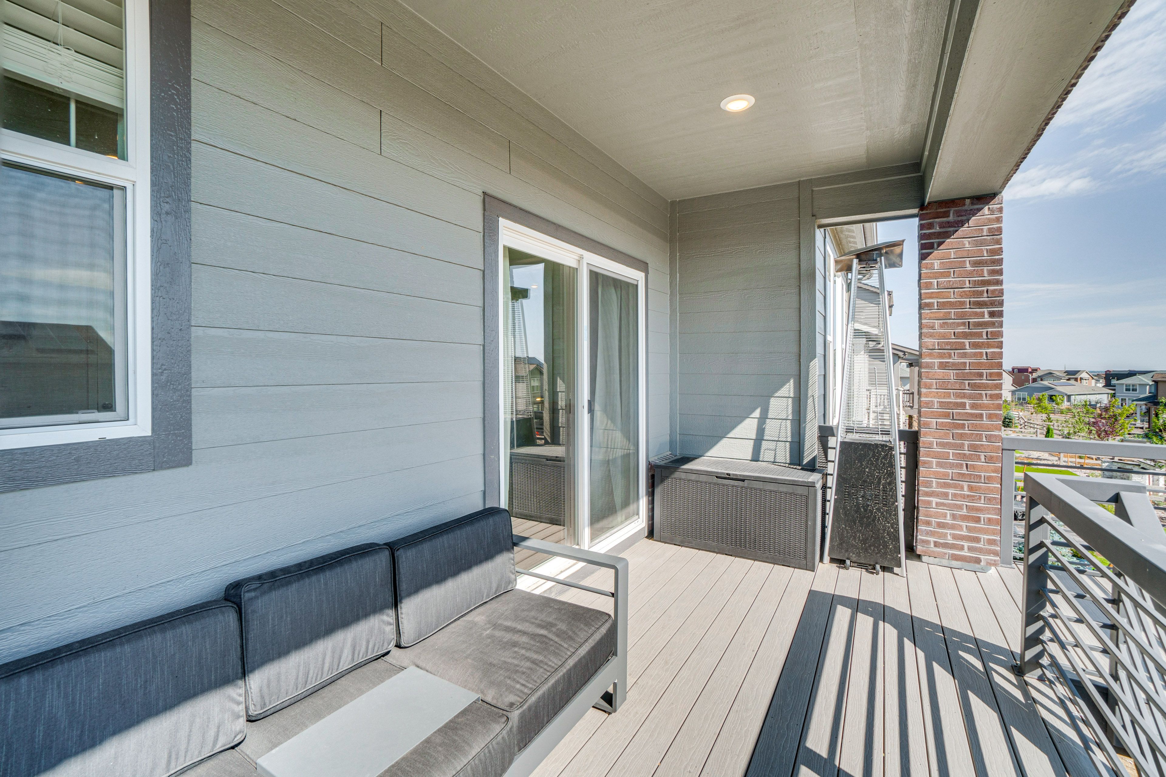 House Exterior | Furnished Balcony | Gas & Charcoal Grills