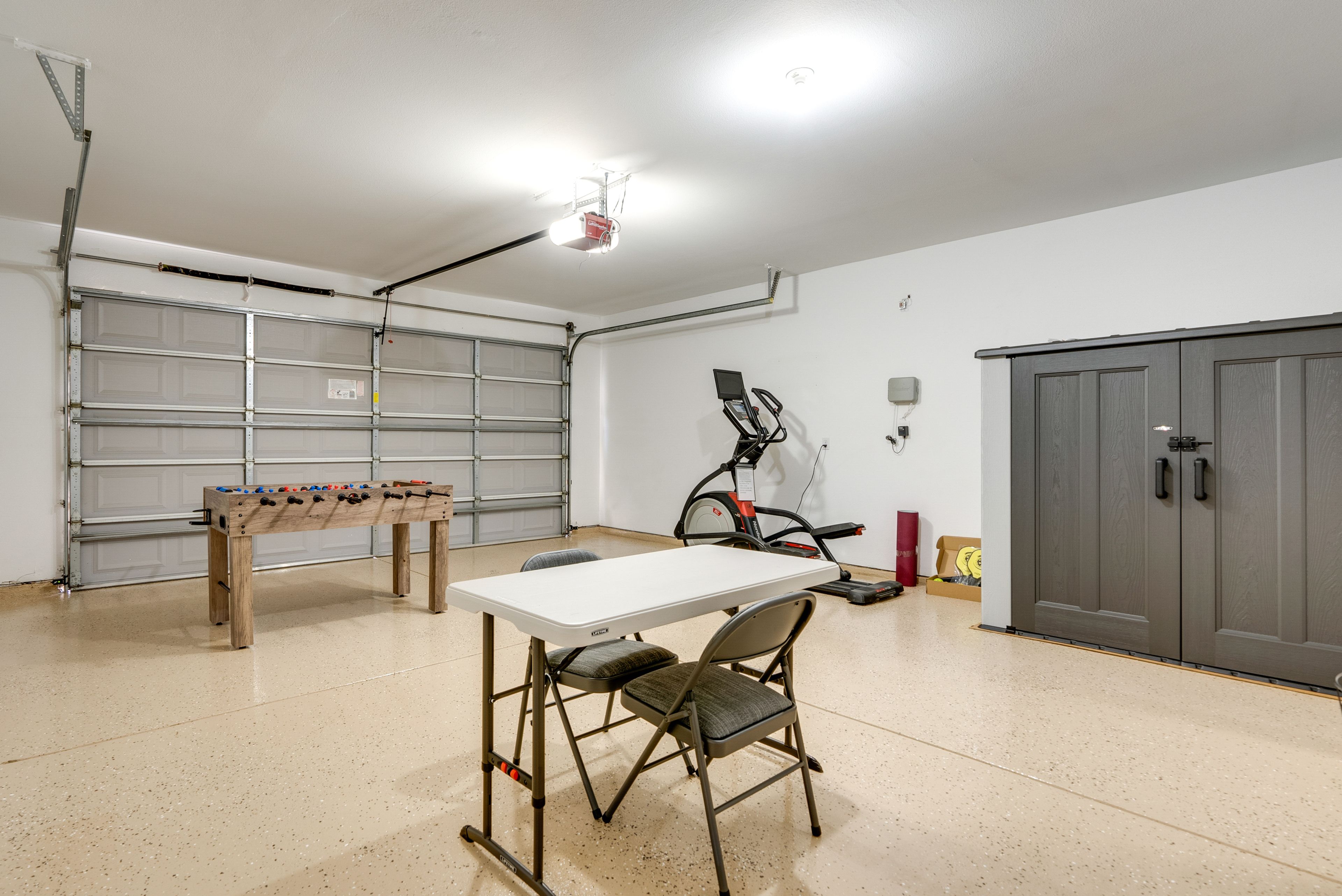 Garage | Foosball Table | Elliptical Machine | Yoga Mat