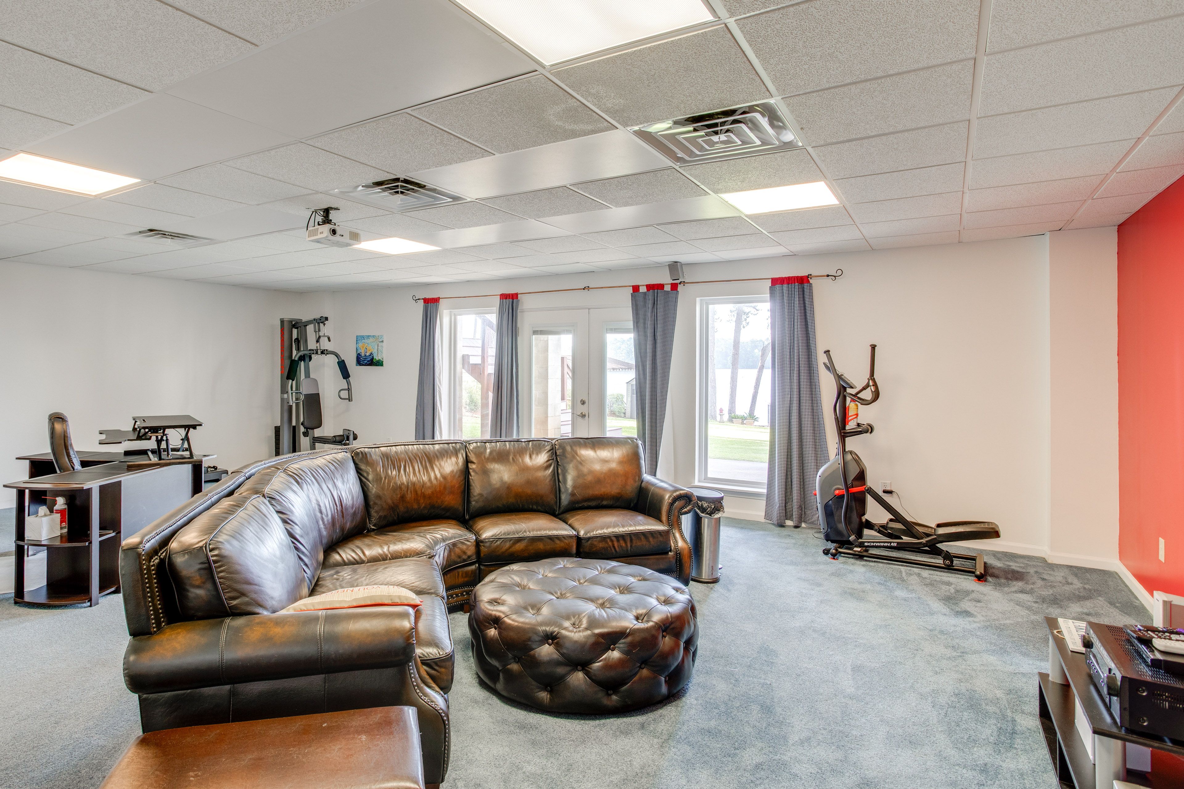 Den | Home Theater | Laptop Workspace | Basement Level