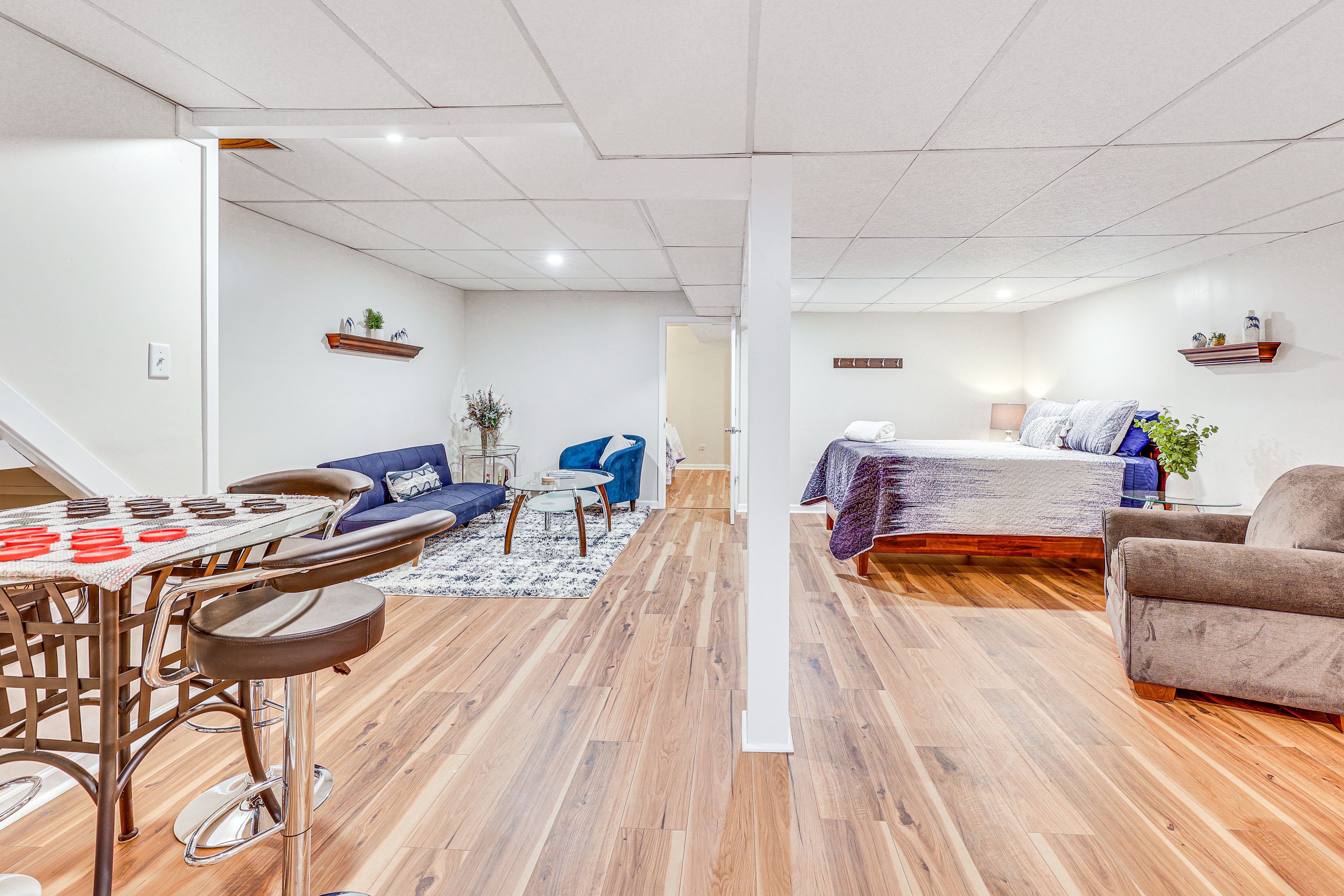 Living Room | Queen Bed | Full Futon | Twin Sleeper Sofa | Basement