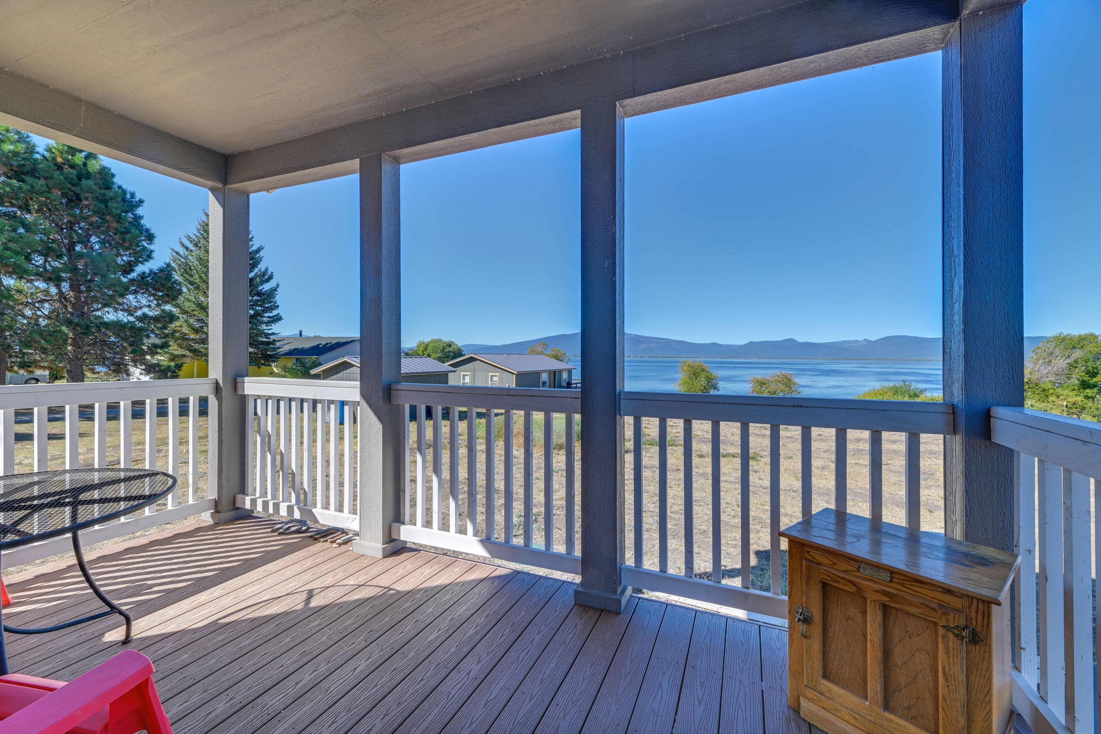Cabin Exterior | Furnished Porch | Lake & Mountain Views