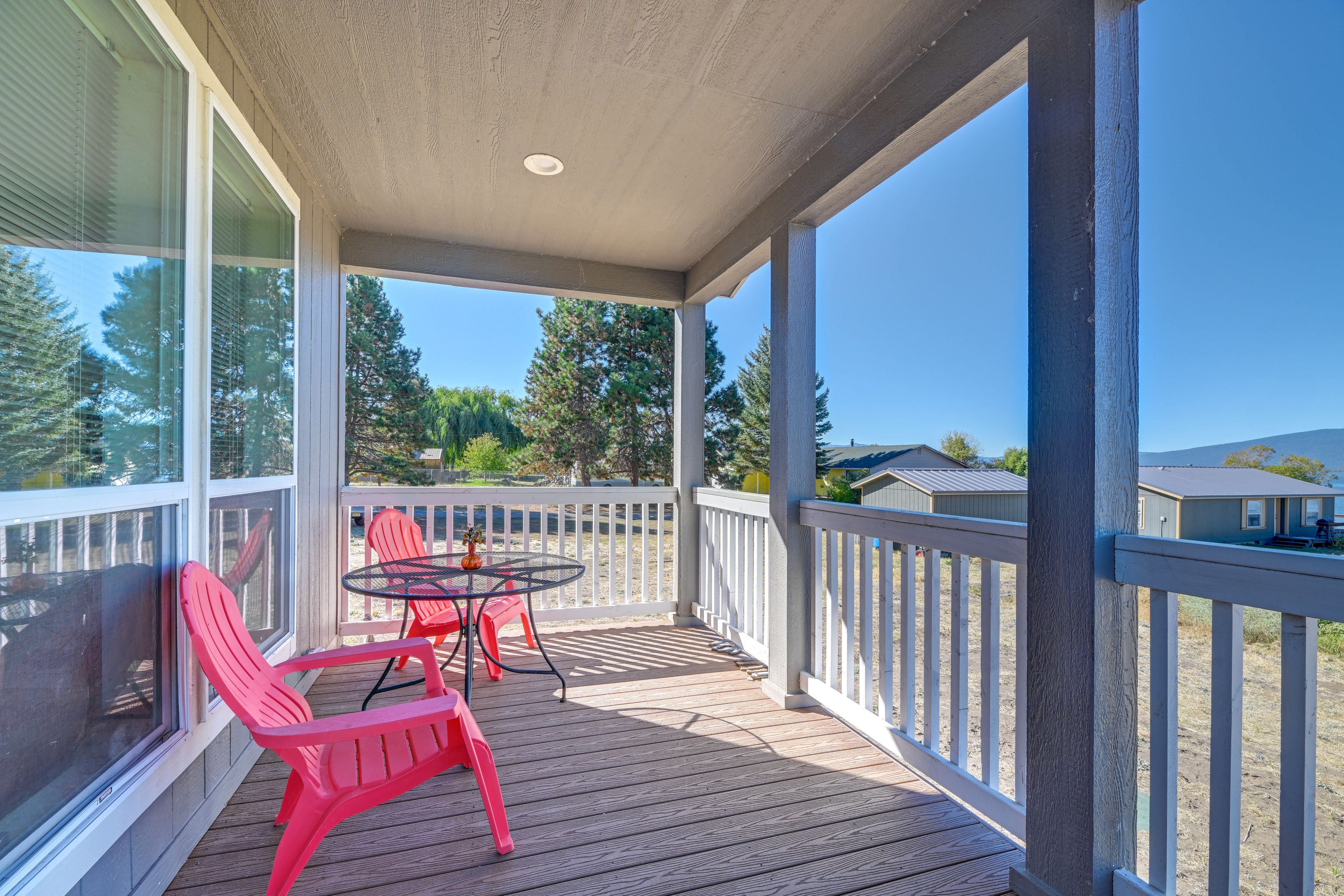Cabin Exterior | Furnished Porch | Dining Area
