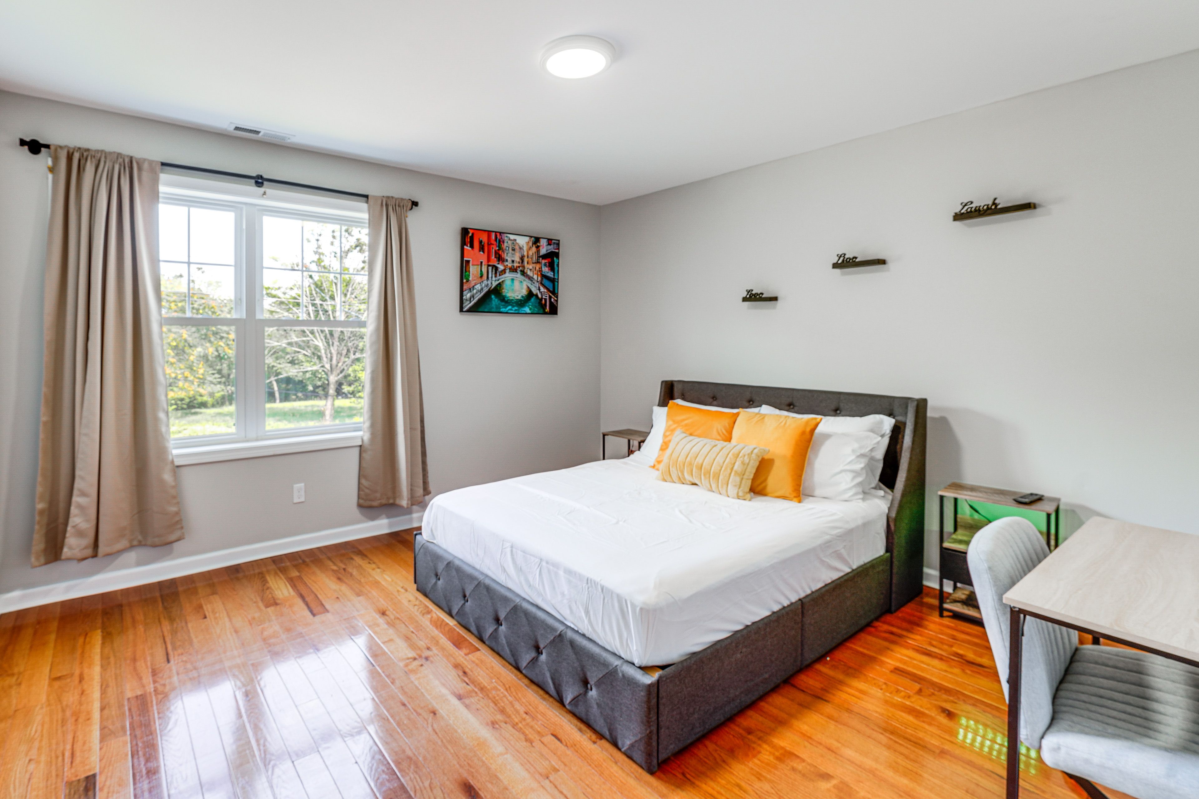 Bedroom 1 | 2nd Floor | Queen Bed | Linens Provided | Desk Workspace | Smart TV