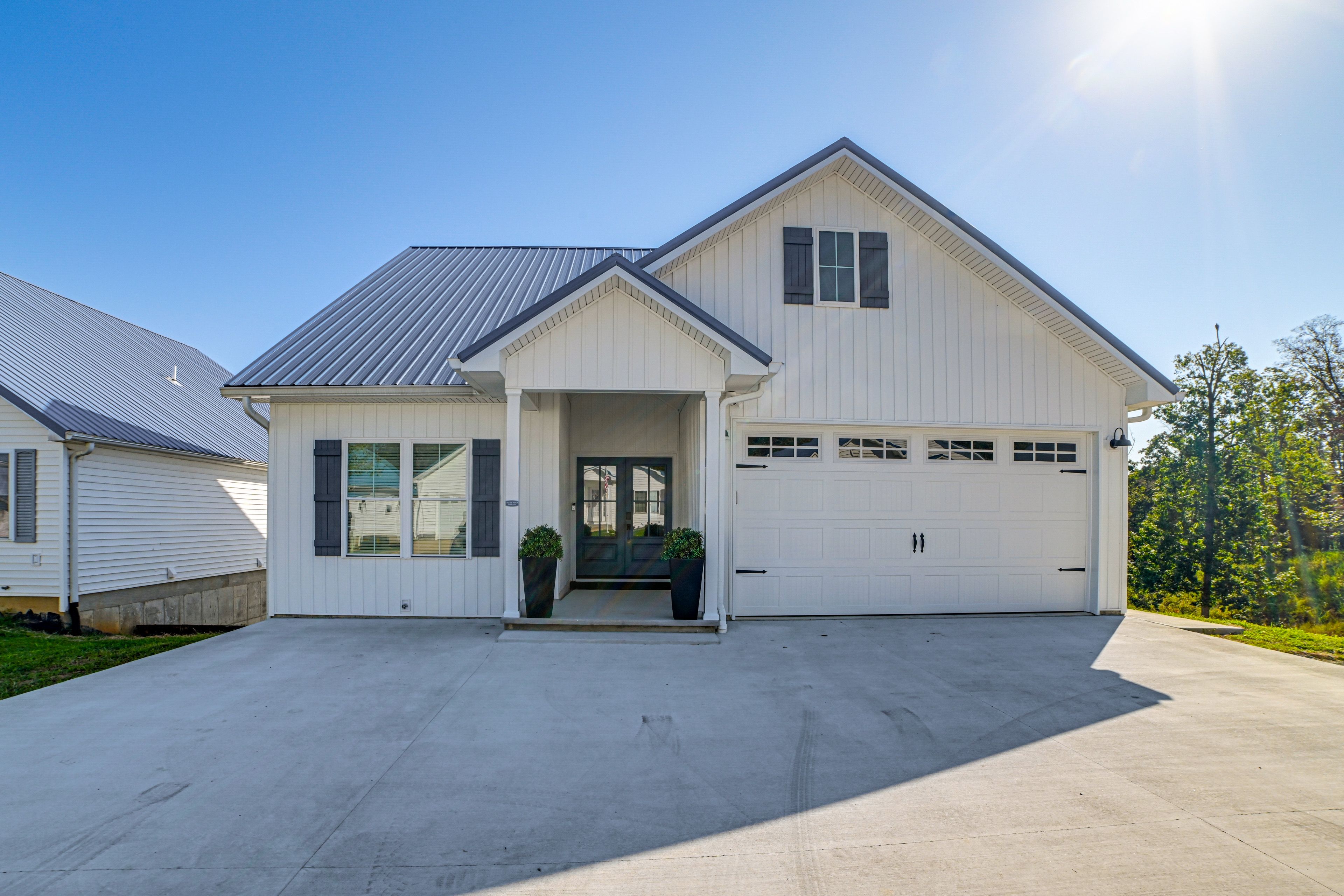 Parking | Driveway (4 Vehicles) | No Garage Access