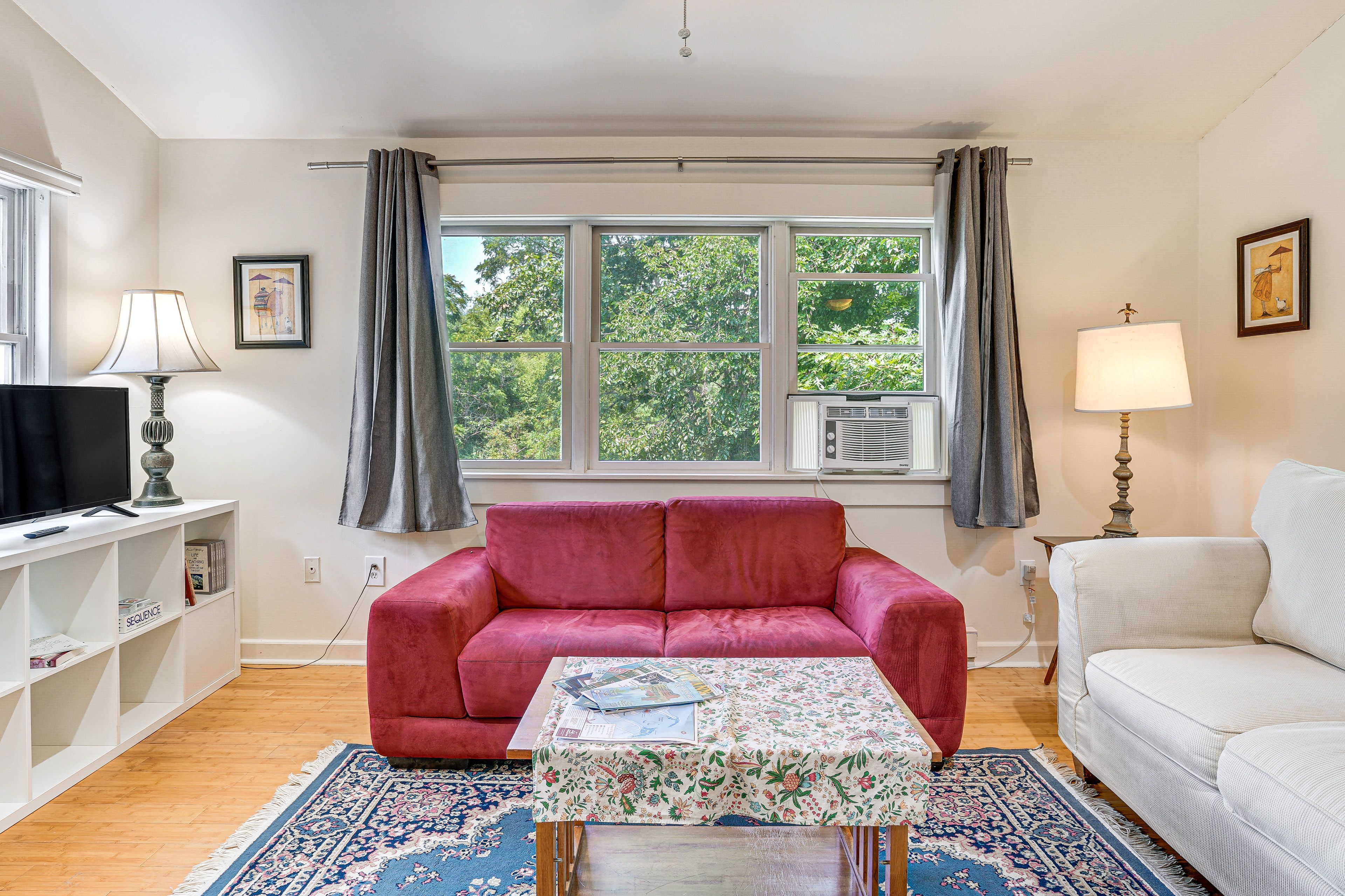 Living Room | Smart TV | Central Heating | Window A/C Units | Free WiFi | Books