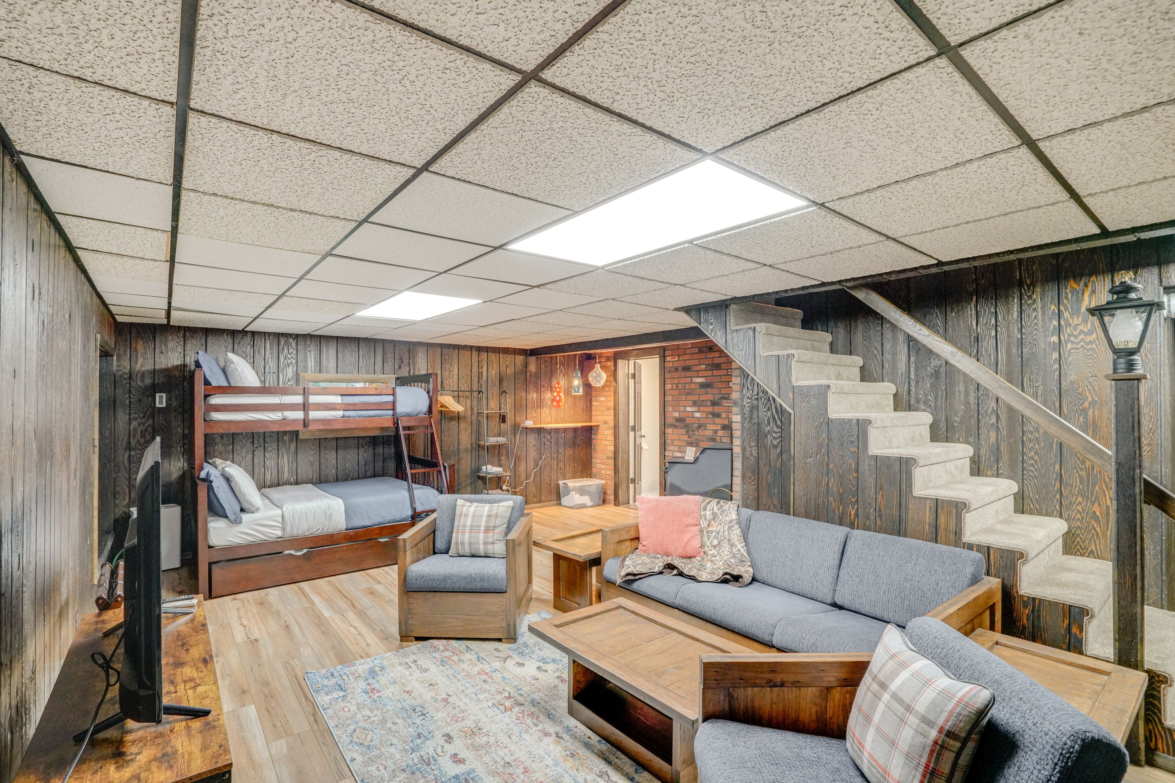 Den | Twin/Full Bunk Bed w/ Twin Trundle | Full Sleeper Sofa | Basement Level