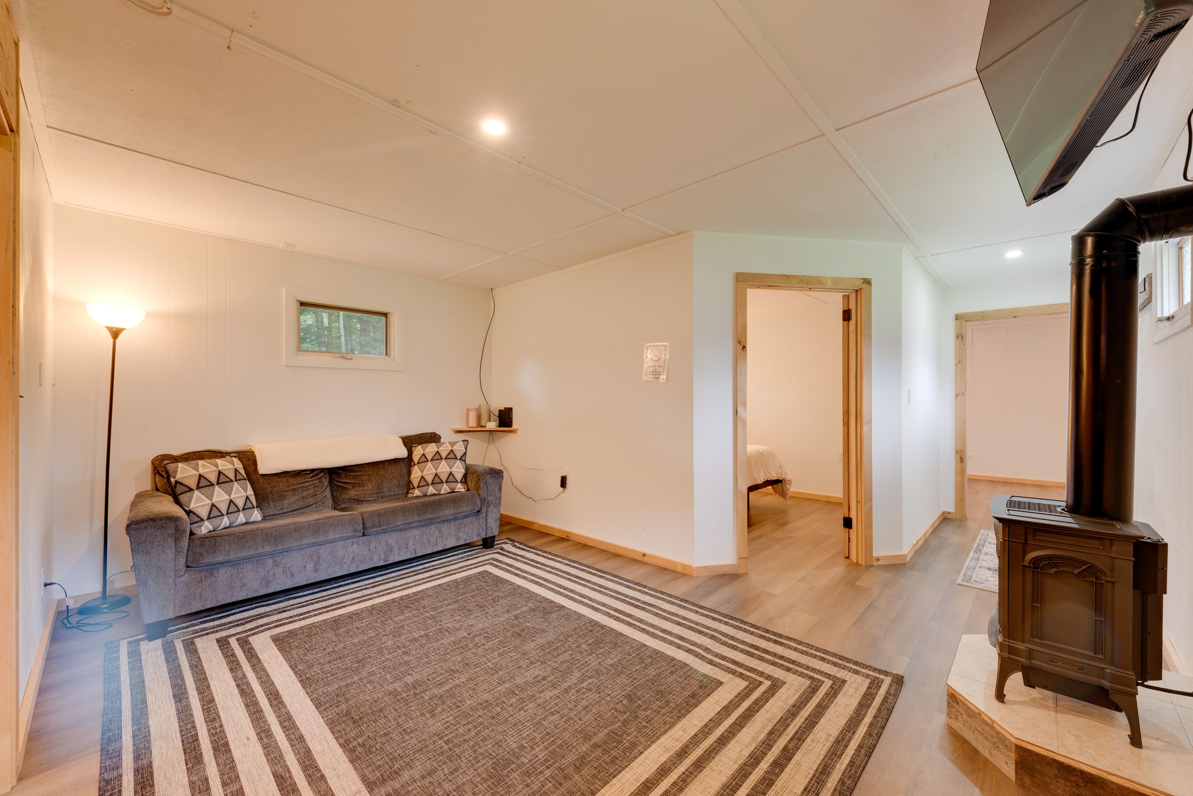 Living Room | Gas Fireplace | Flat-Screen TV | Queen Sleeper Sofa