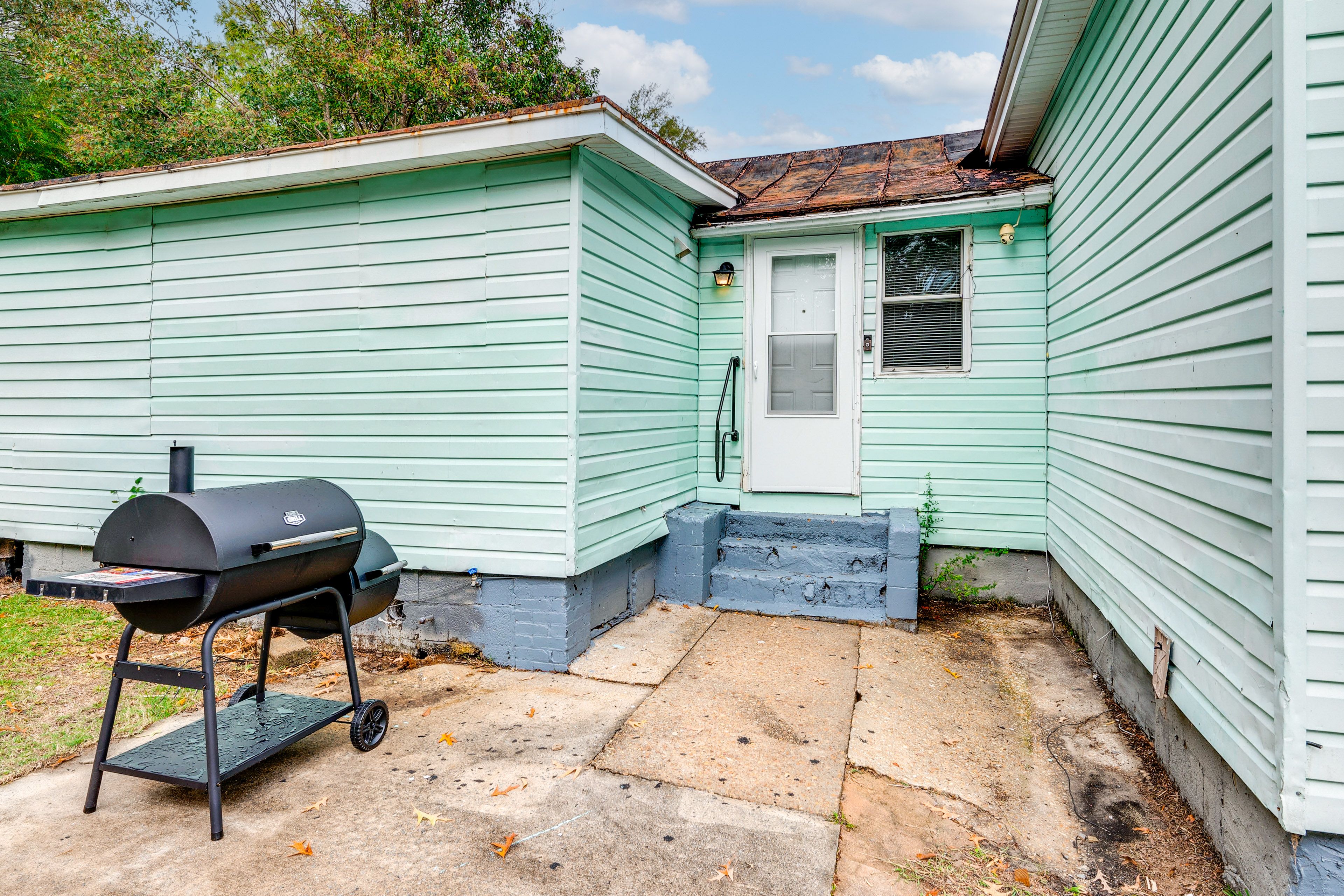 Back Exterior | Charcoal Grill | Fire Pit | Fenced Yard