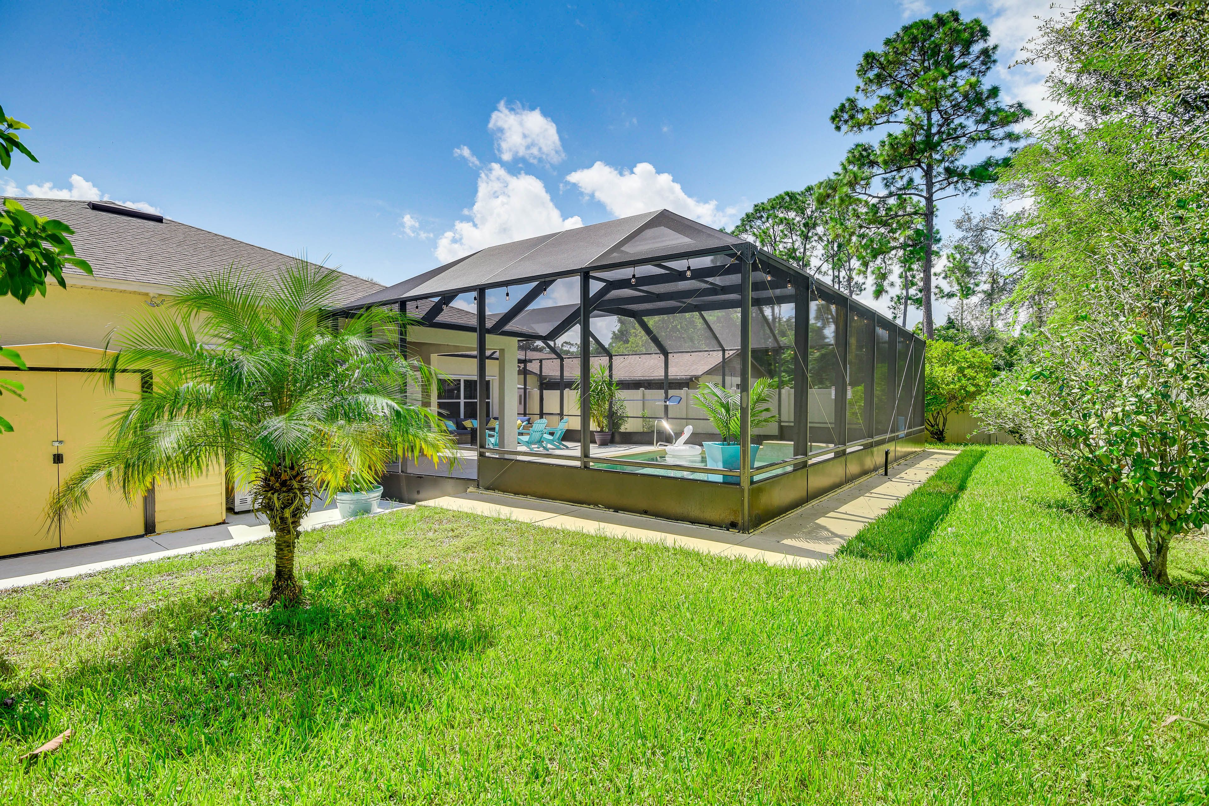 Lanai Exterior | Fenced Backyard