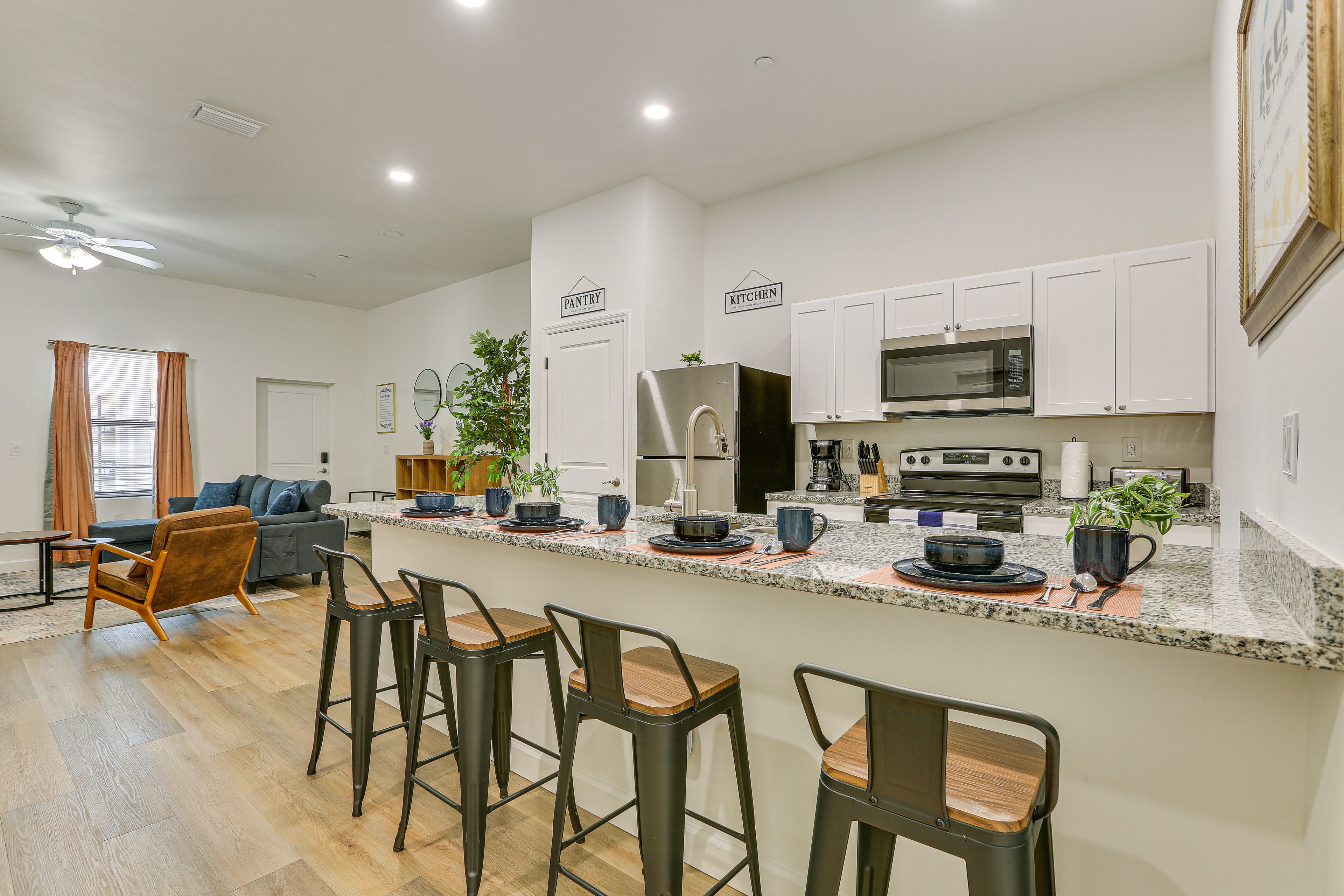 Kitchen | Single-Story Apartment | Breakfast Bar w/ Seating