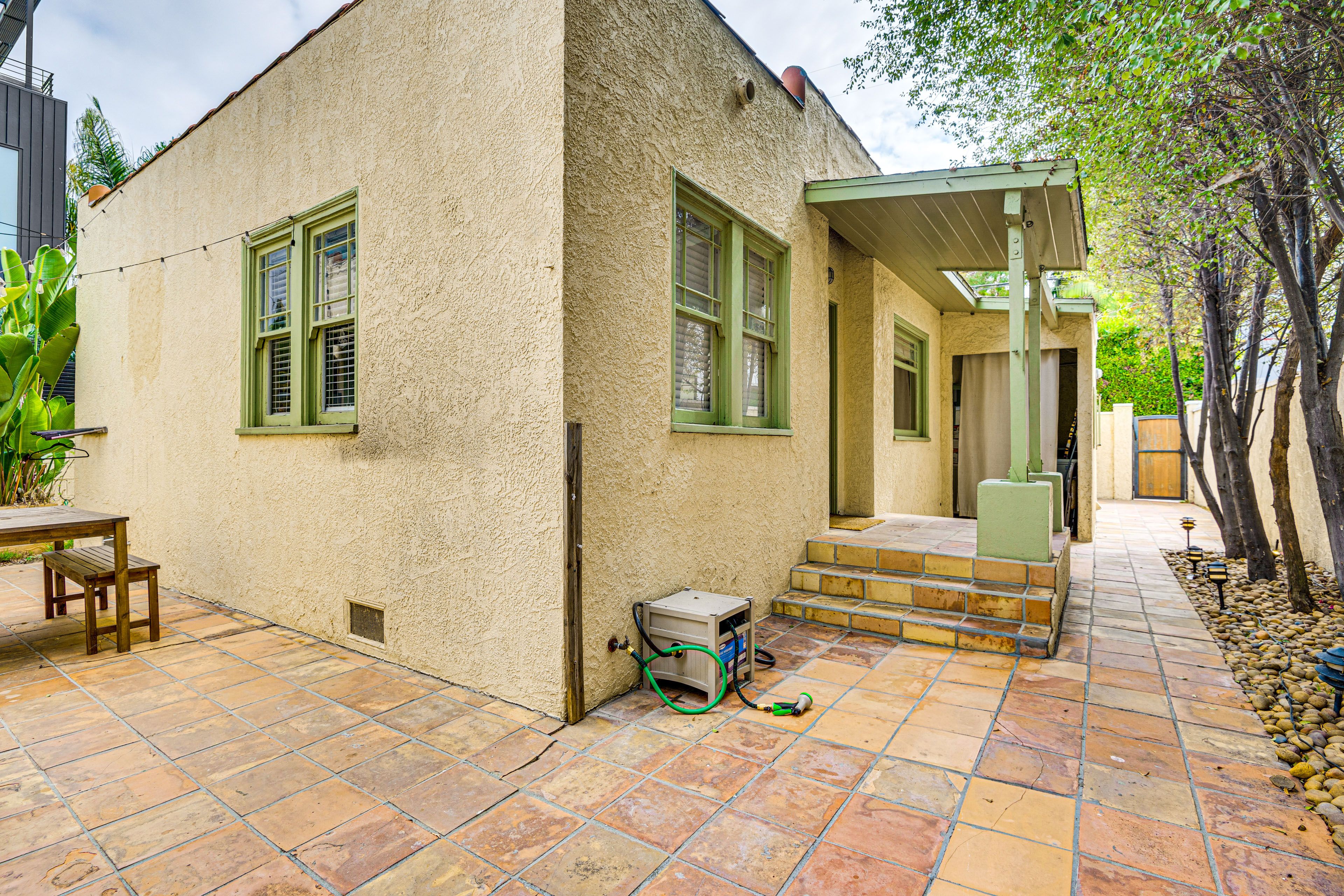 Cottage Exterior | Access to Shared Patio