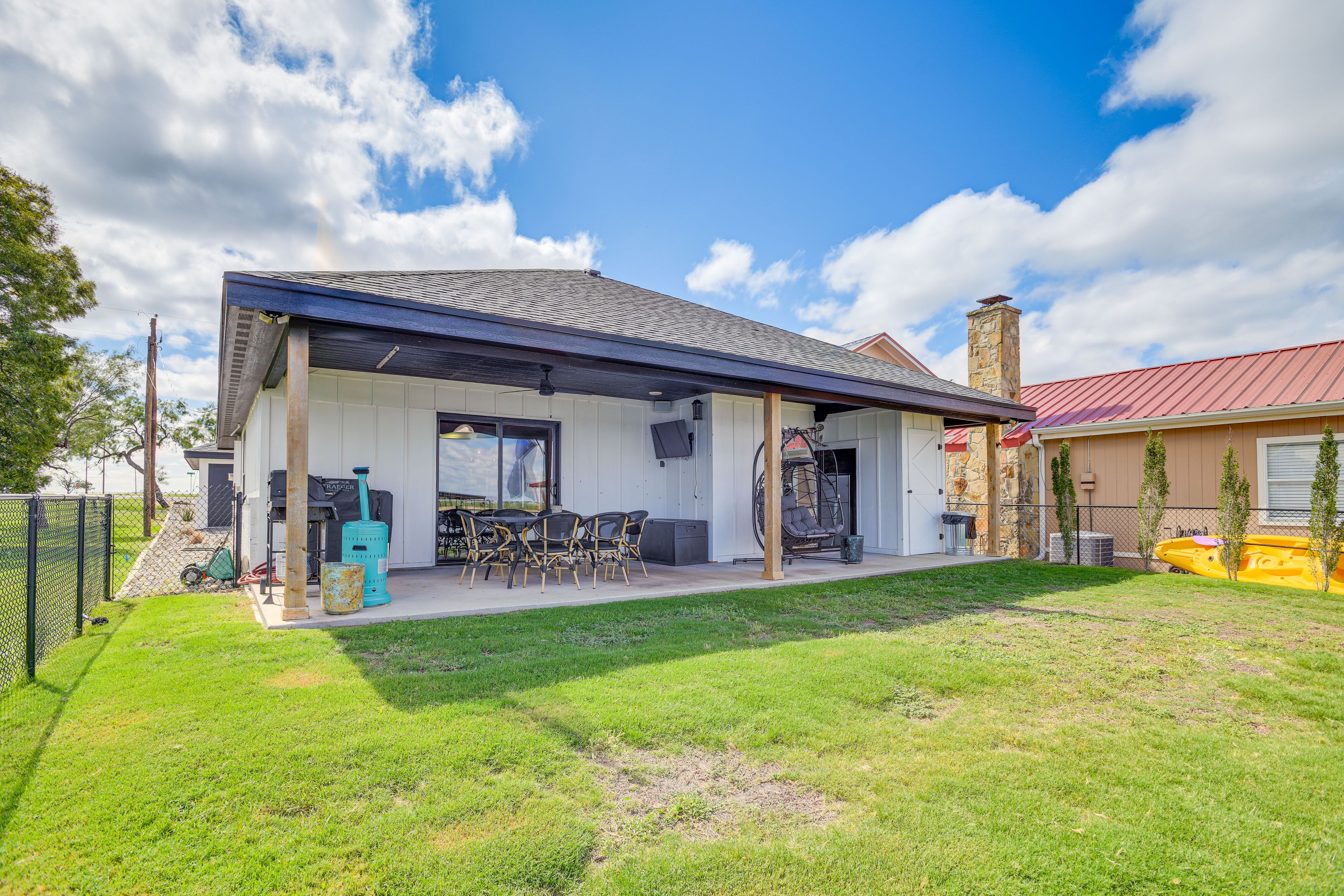 Property Exterior | Fenced Backyard | Access to Lake | Private Dock