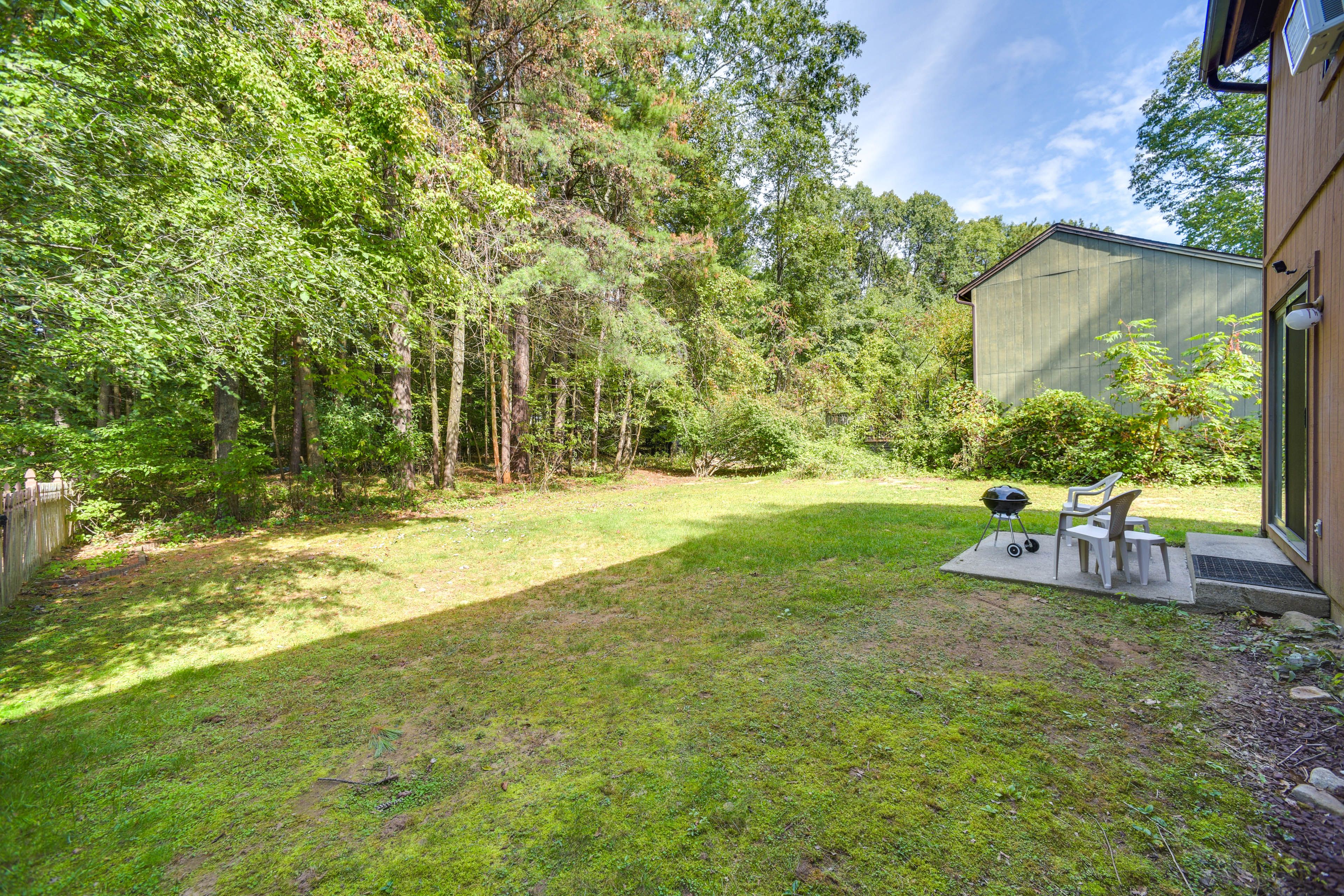 Townhome Exterior | Furnished Patio | Charcoal Grill | Private Yard