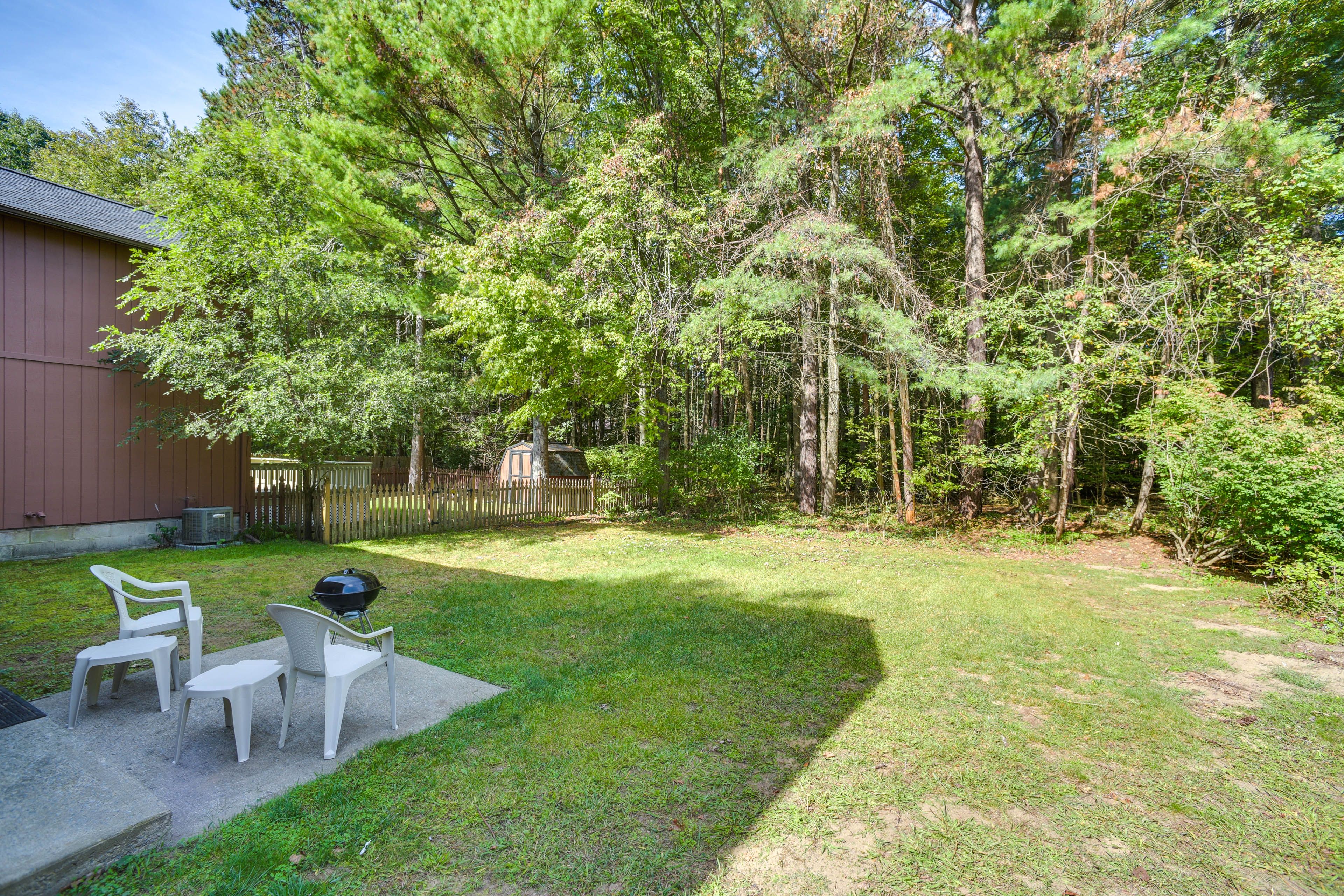 Townhome Exterior | Furnished Patio | Charcoal Grill | Private Yard