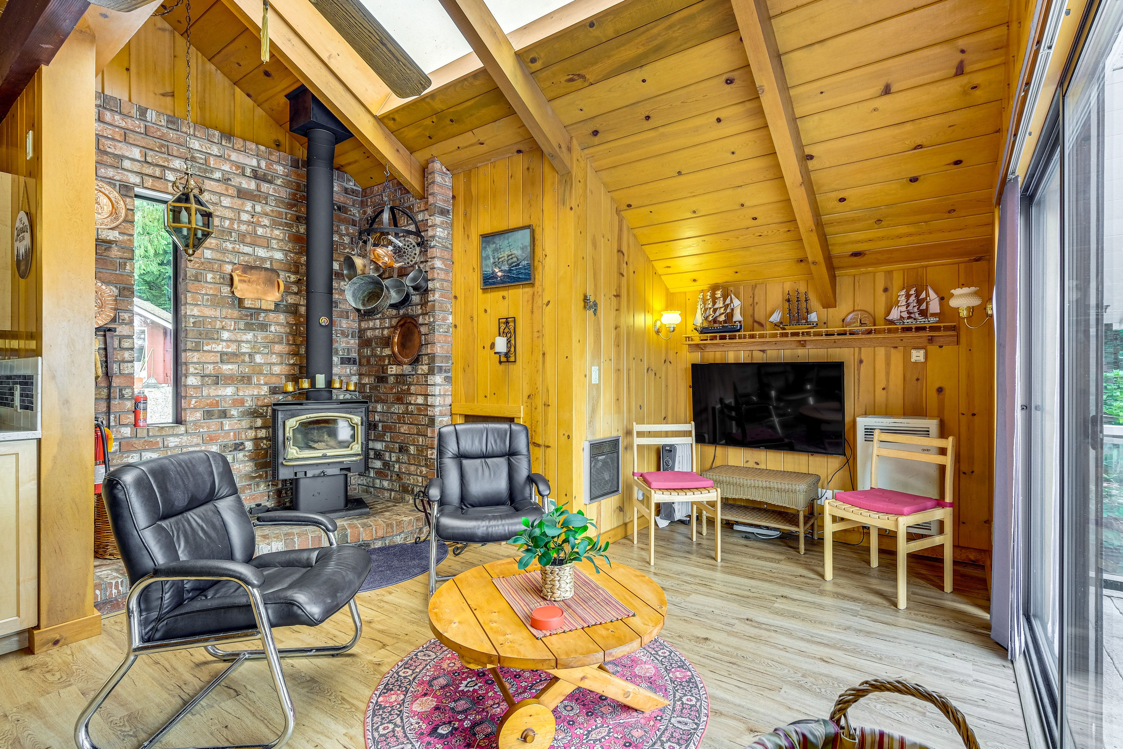 Den | 1st Floor | Wood-Burning Stove | Flat-Screen TV