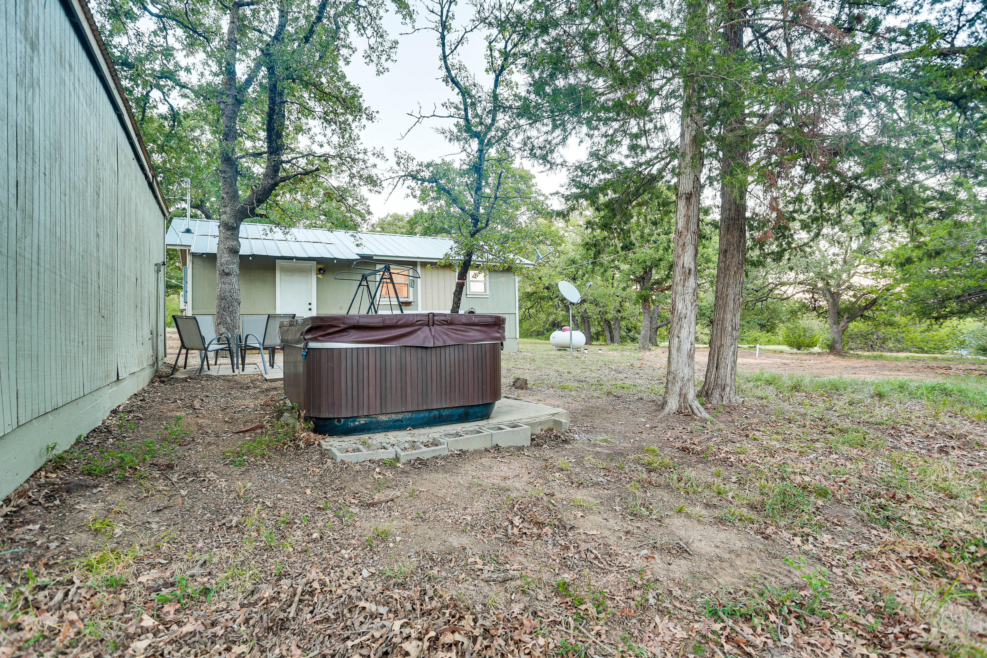Studio Exterior | Private Hot Tub | Patio w/ Seating | Gas Grill