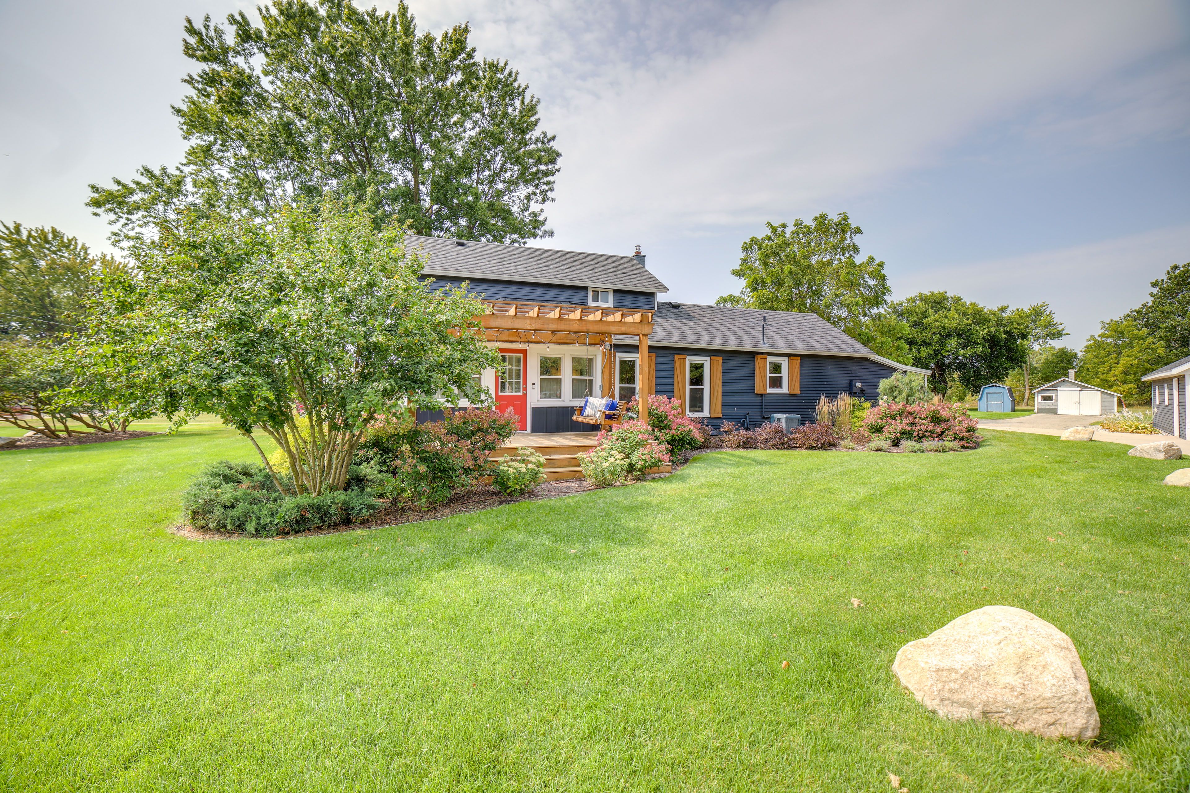 Property Exterior | 2-Story Main House w/ Single-Story Bunkhouse