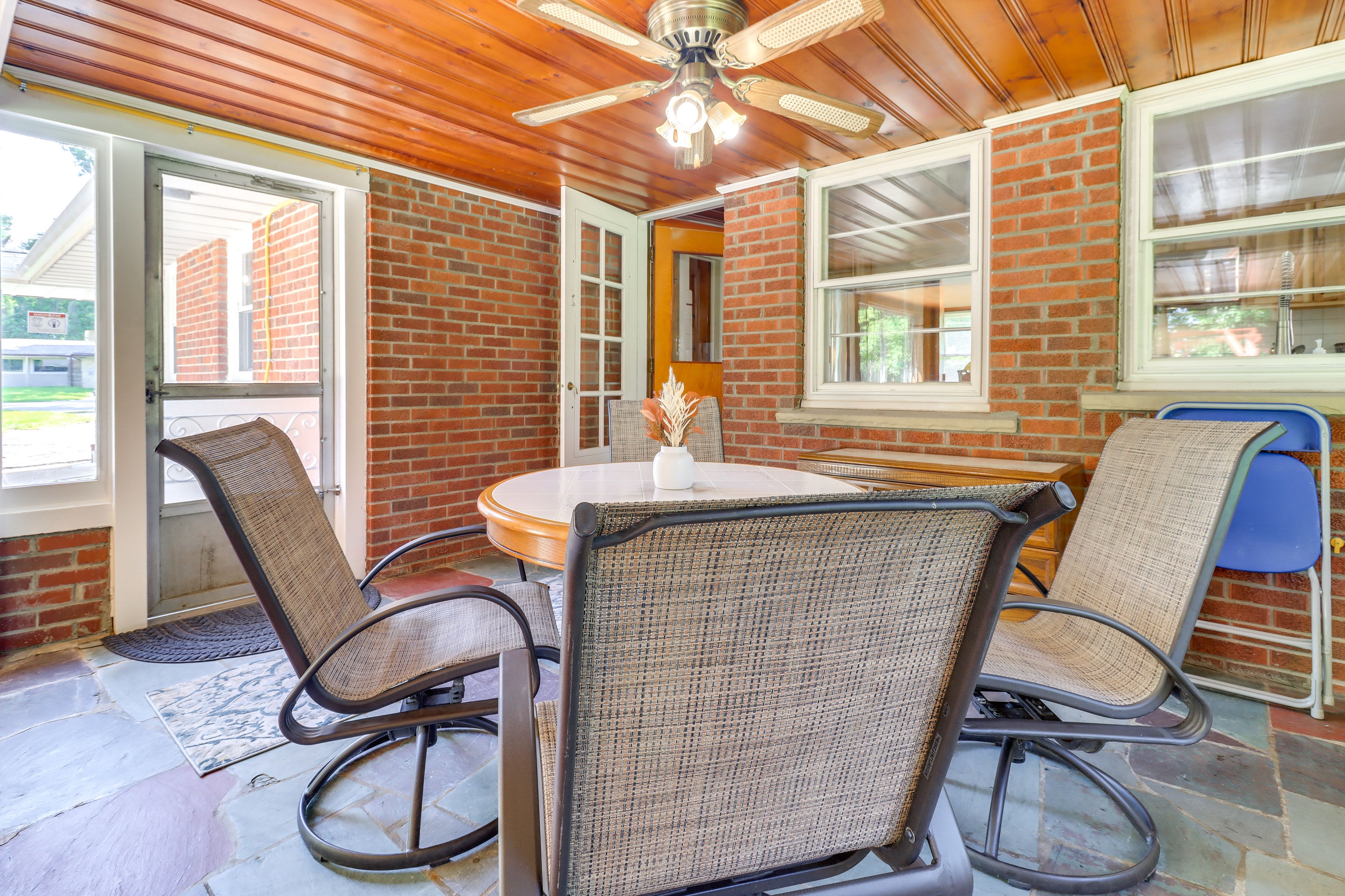 House Exterior | Screened Sunroom | Dining Area