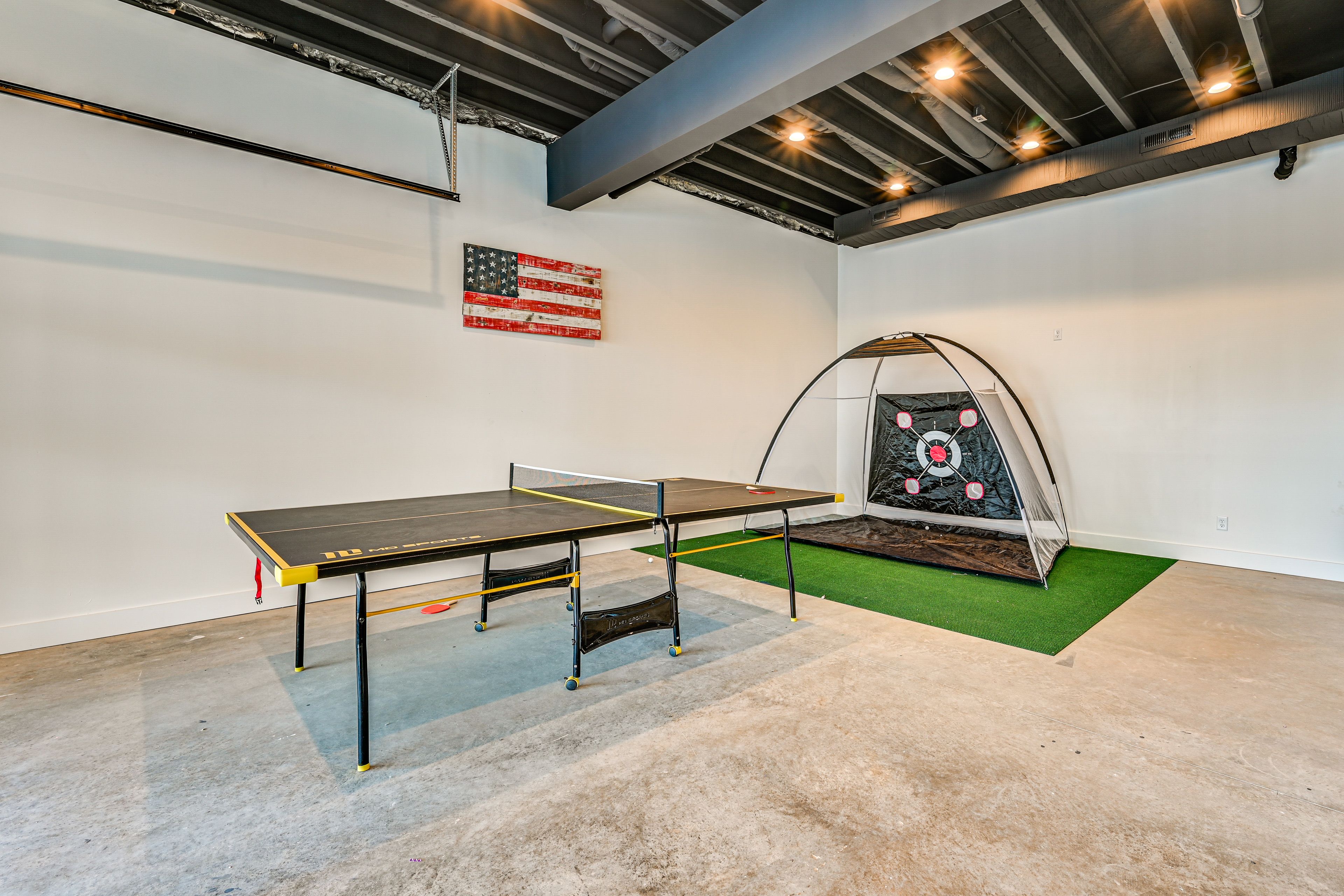 Game Room (Garage) | Ping-Pong Table | Dartboard | Golf Tent | Basement Level