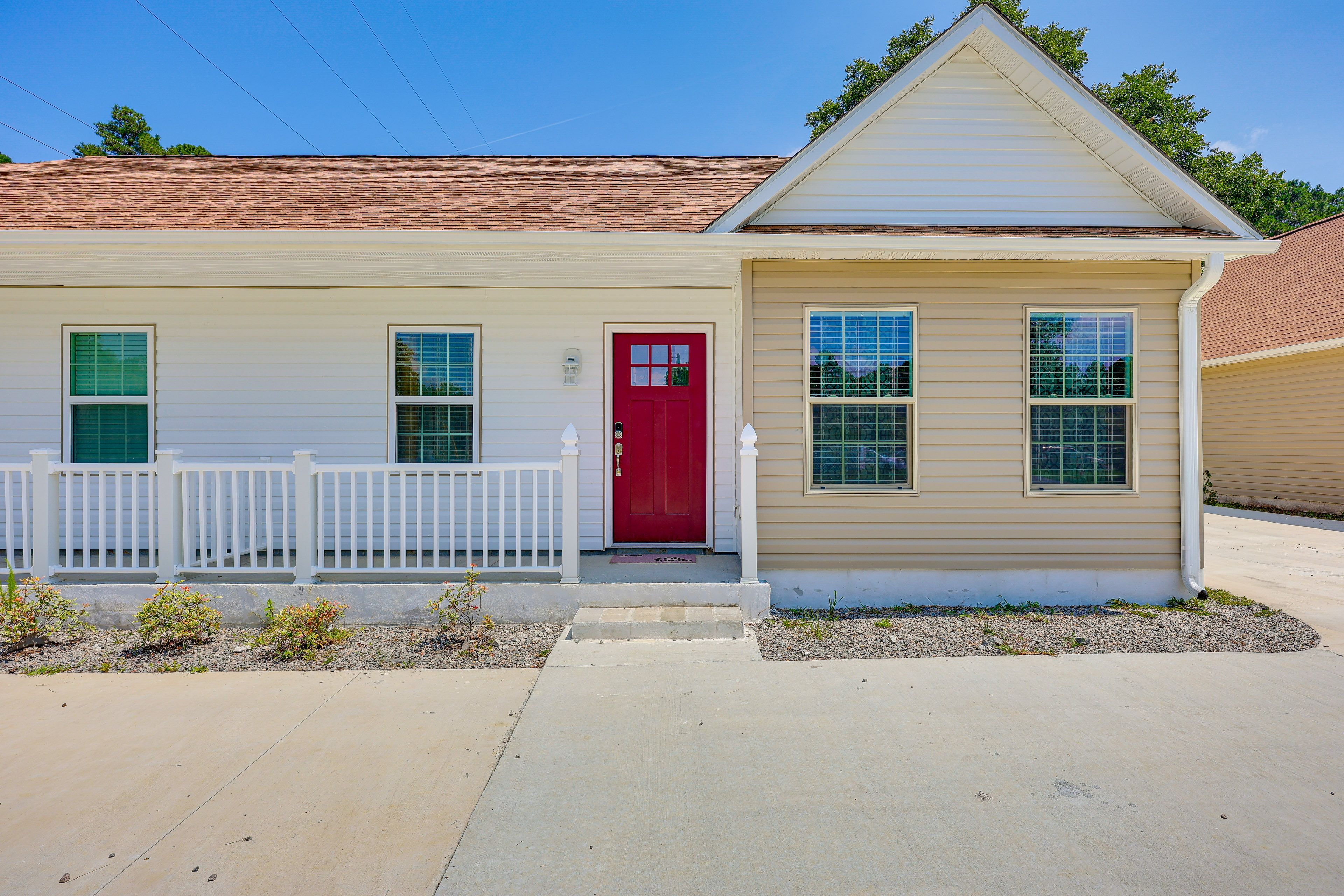 Duplex Exterior | Single-Story Unit | Private Patio | Shared Backyard