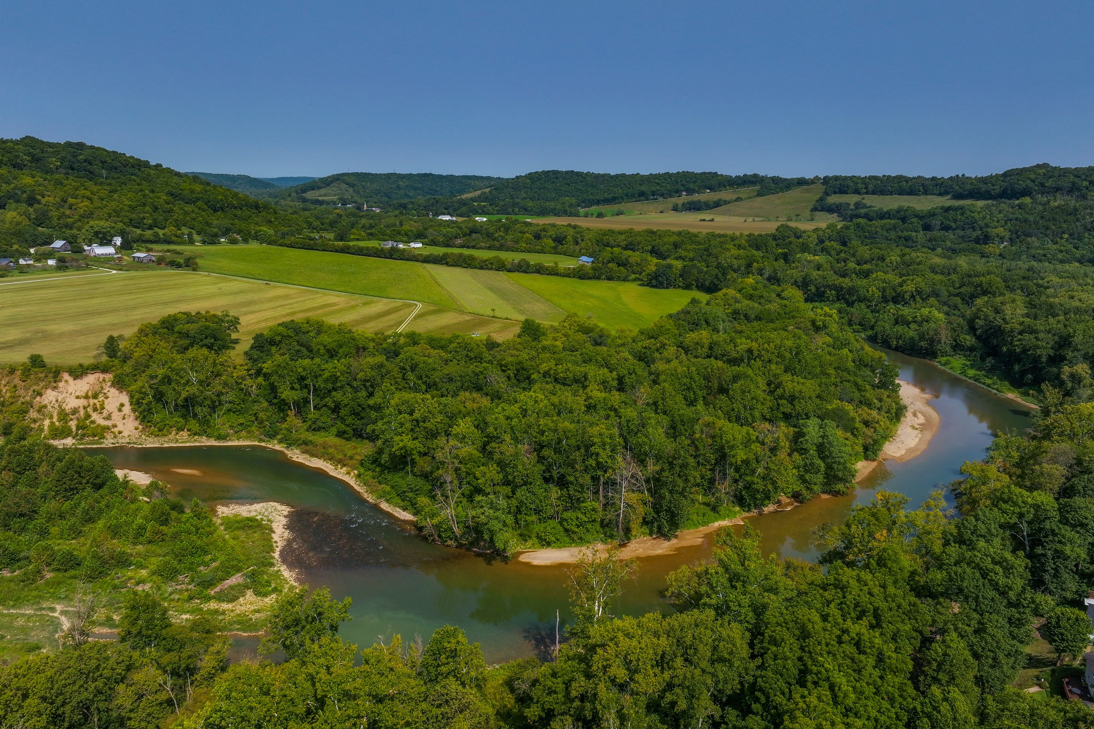 Peaceful Countryside Setting on Private Acreage | Backs Up to River