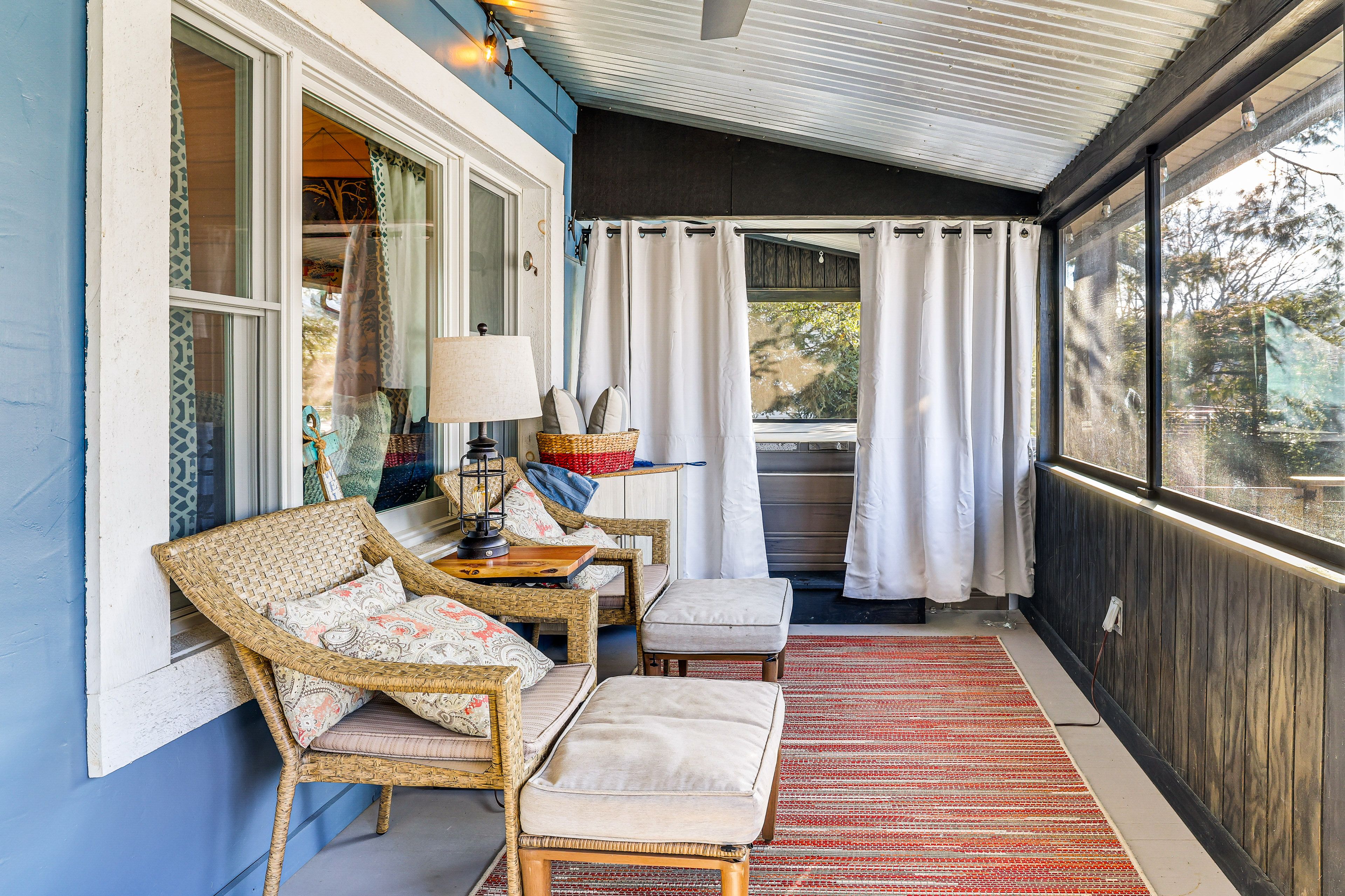Screened-In Porch | Hot Tub | Outdoor Seating & Dining Area