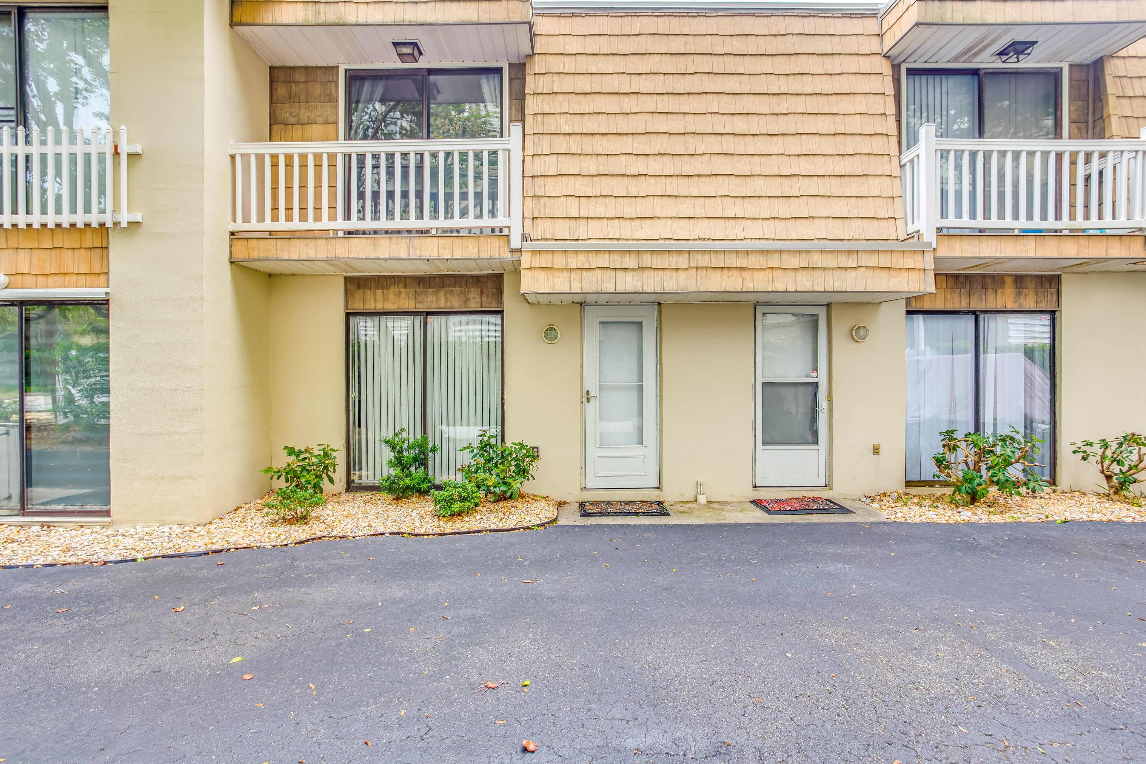 Condo Exterior | Parking | Community Lot (1 Vehicle, First-Come, First-Served)