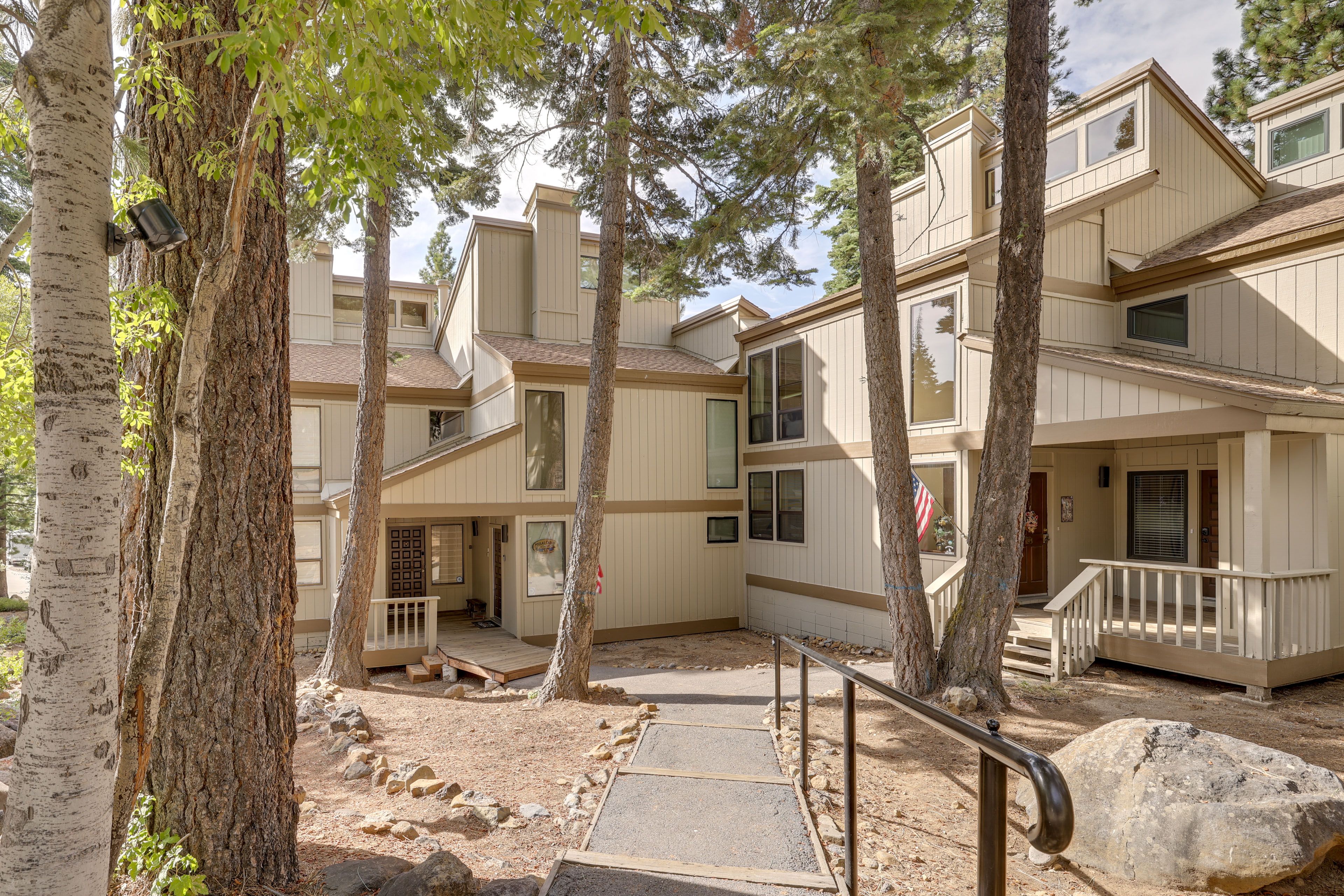 Property Exterior | Community Lot (Open Parking)