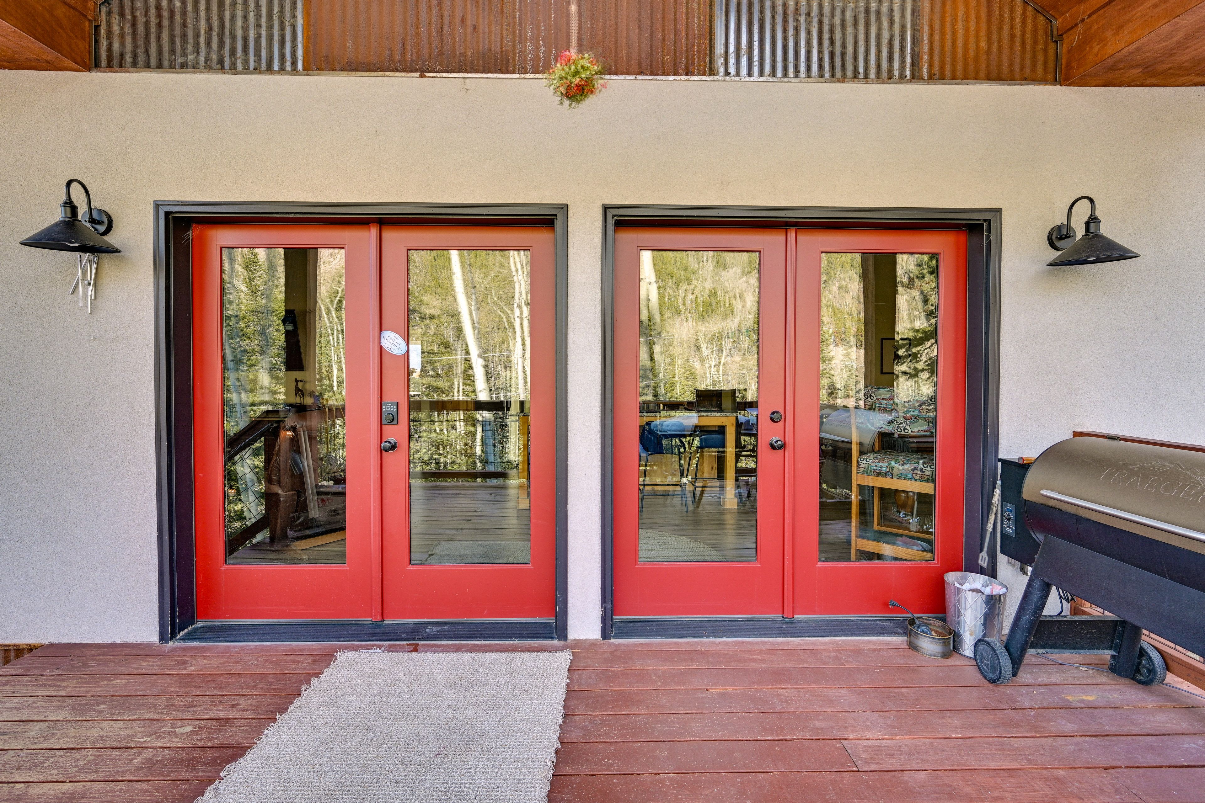 Duplex Exterior | Deck w/ Dining Area | Charcoal Grill/Smoker