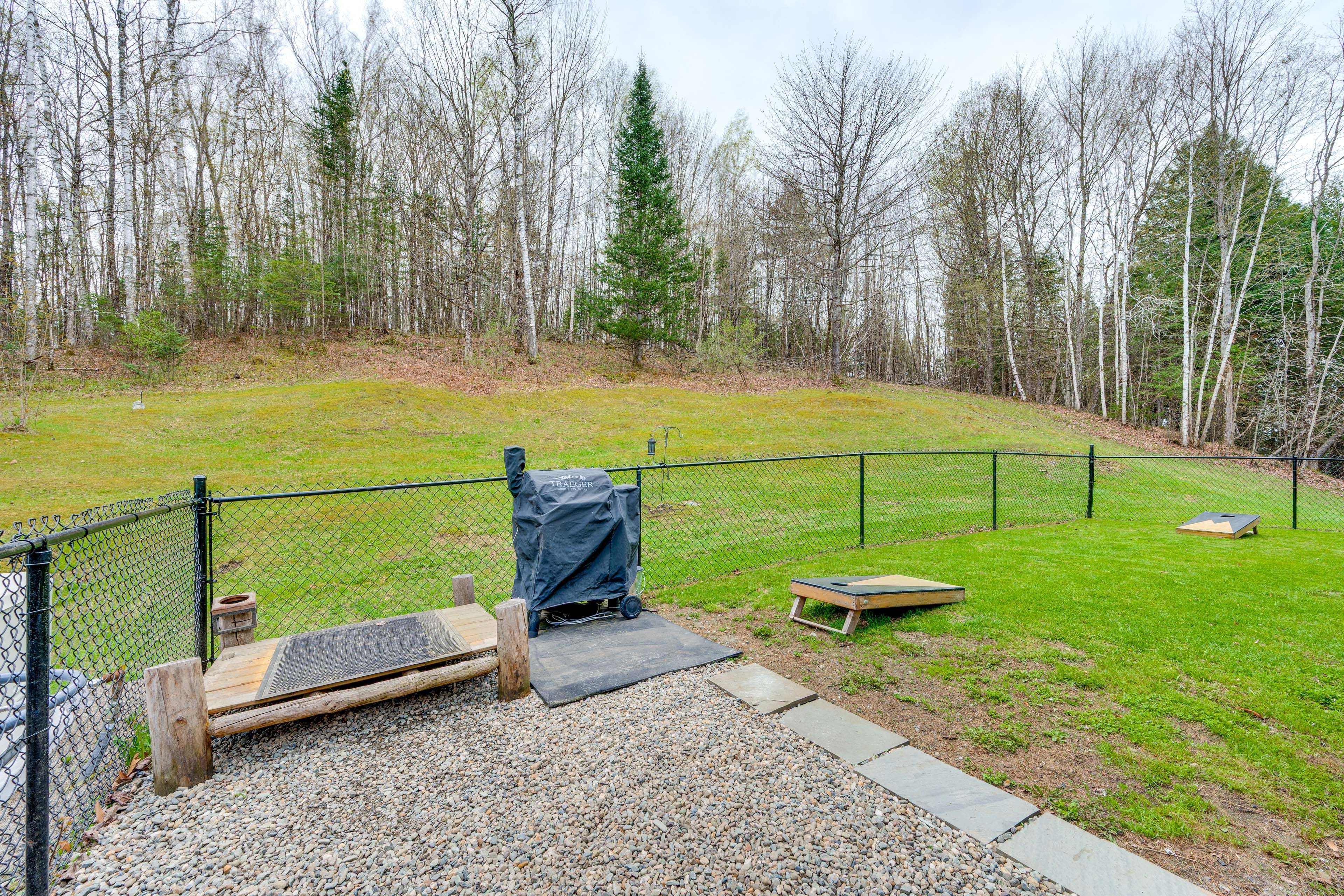 Fenced-In Yard | Cornhole | Traeger Grill