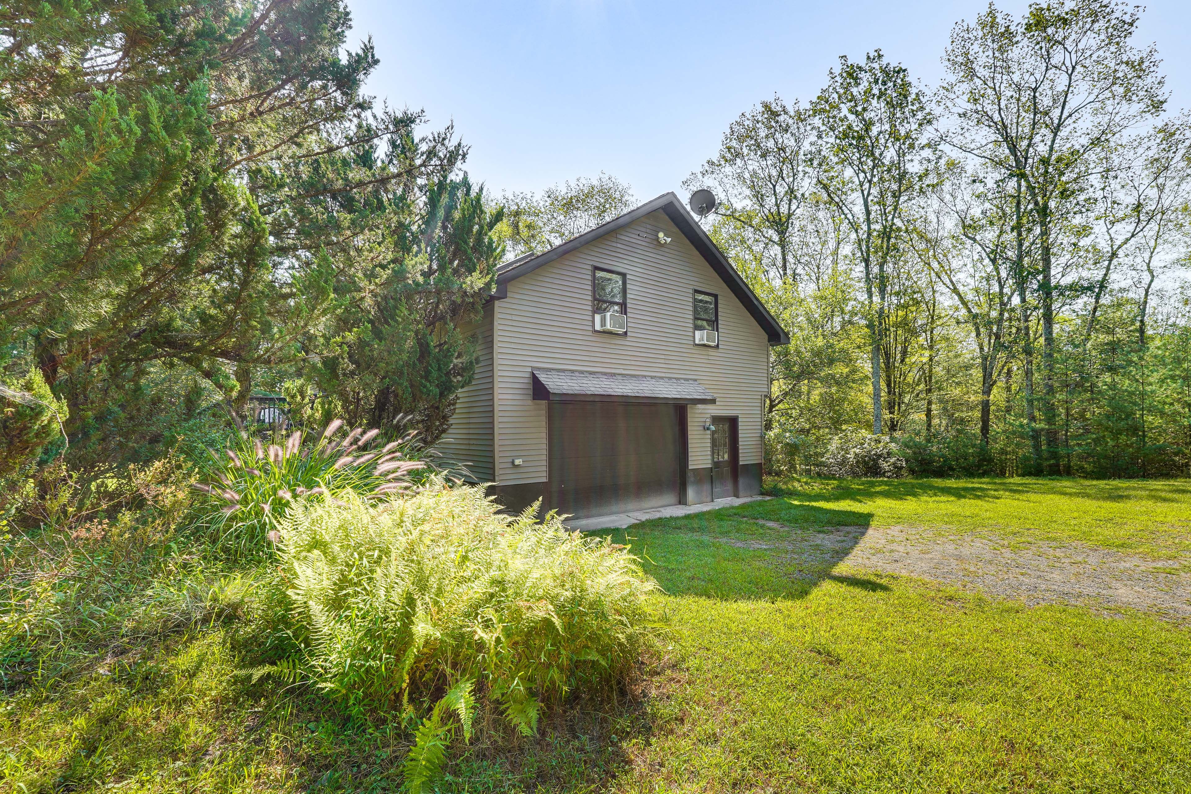 Parking | Garage (1 Vehicle) | Driveway (4 Vehicles) | EV Charger Available