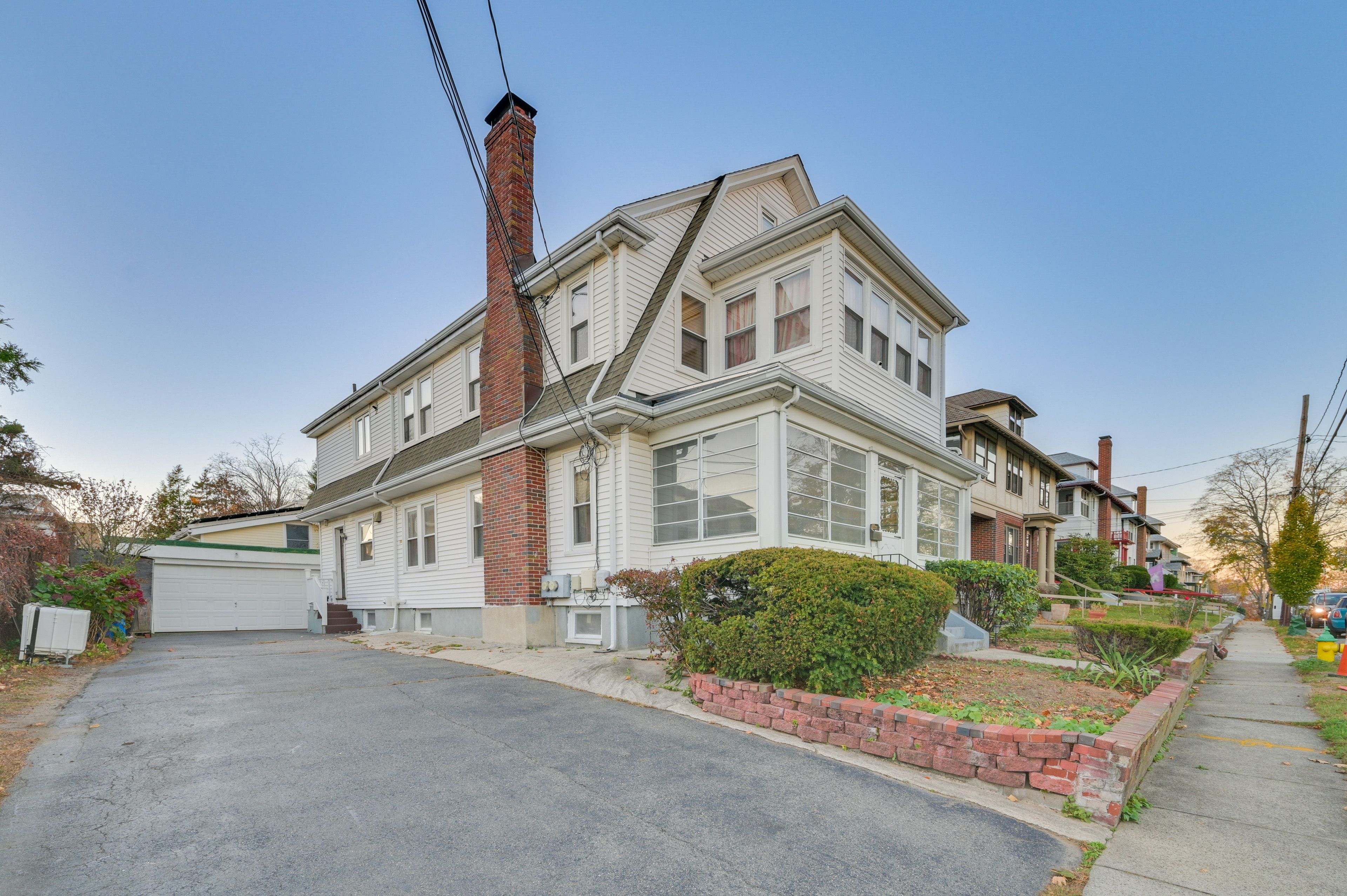 Home Exterior | 1st-Floor Unit Only | Parking | Shared Driveway (2 Vehicles)