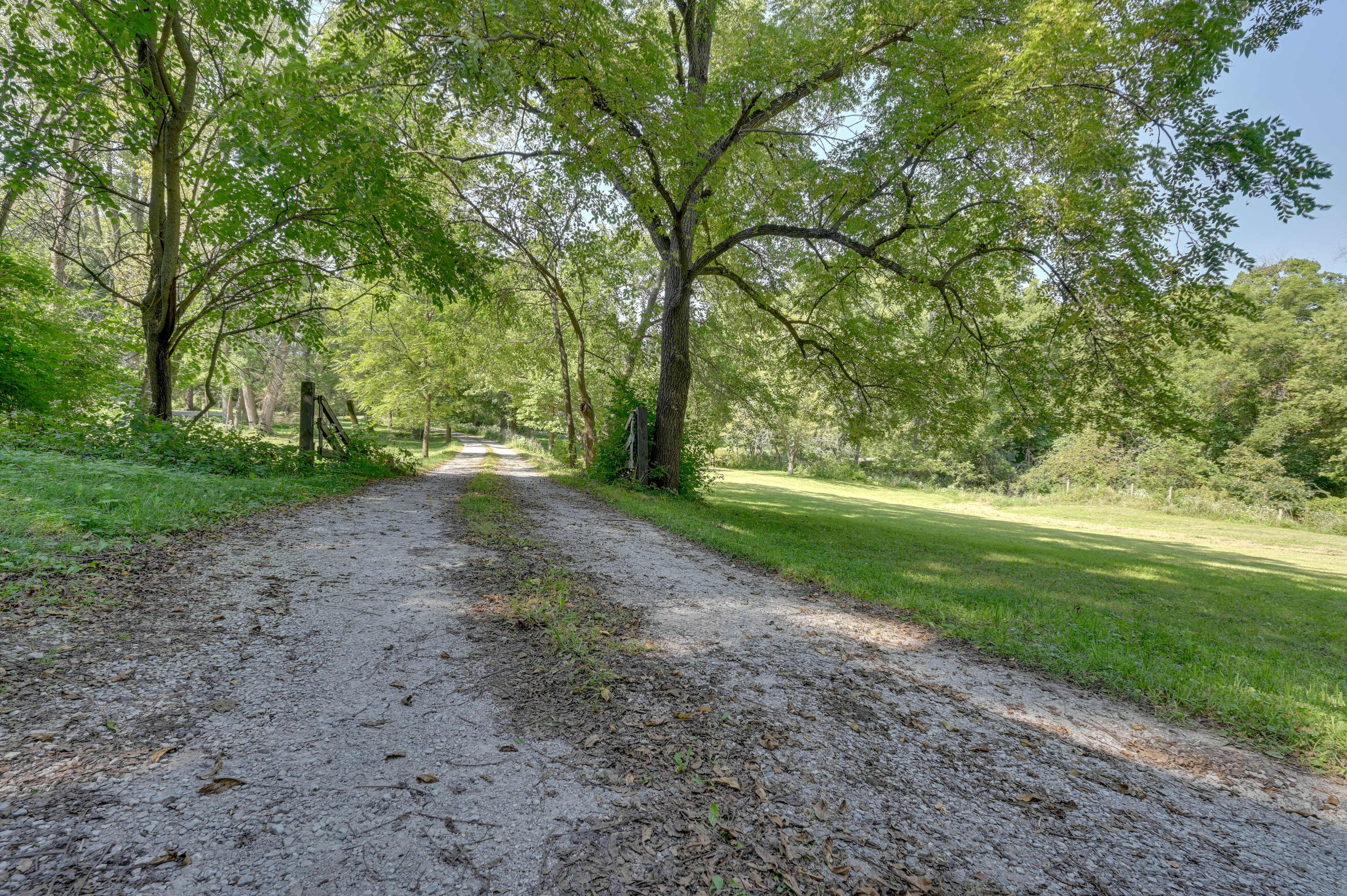 Property Exterior | Shared Gravel Lot (3 Vehicles)
