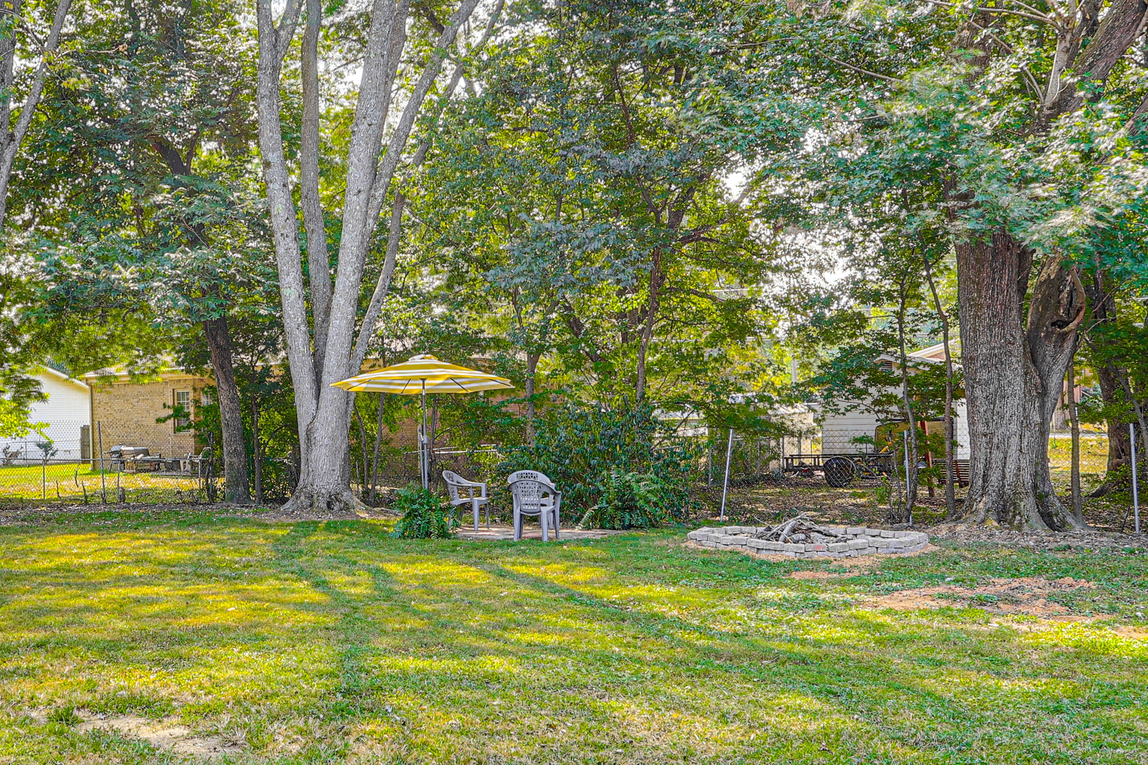Fenced-In Yard | Wood-Burning Fire Pit | Outdoor Seating | Cornhole
