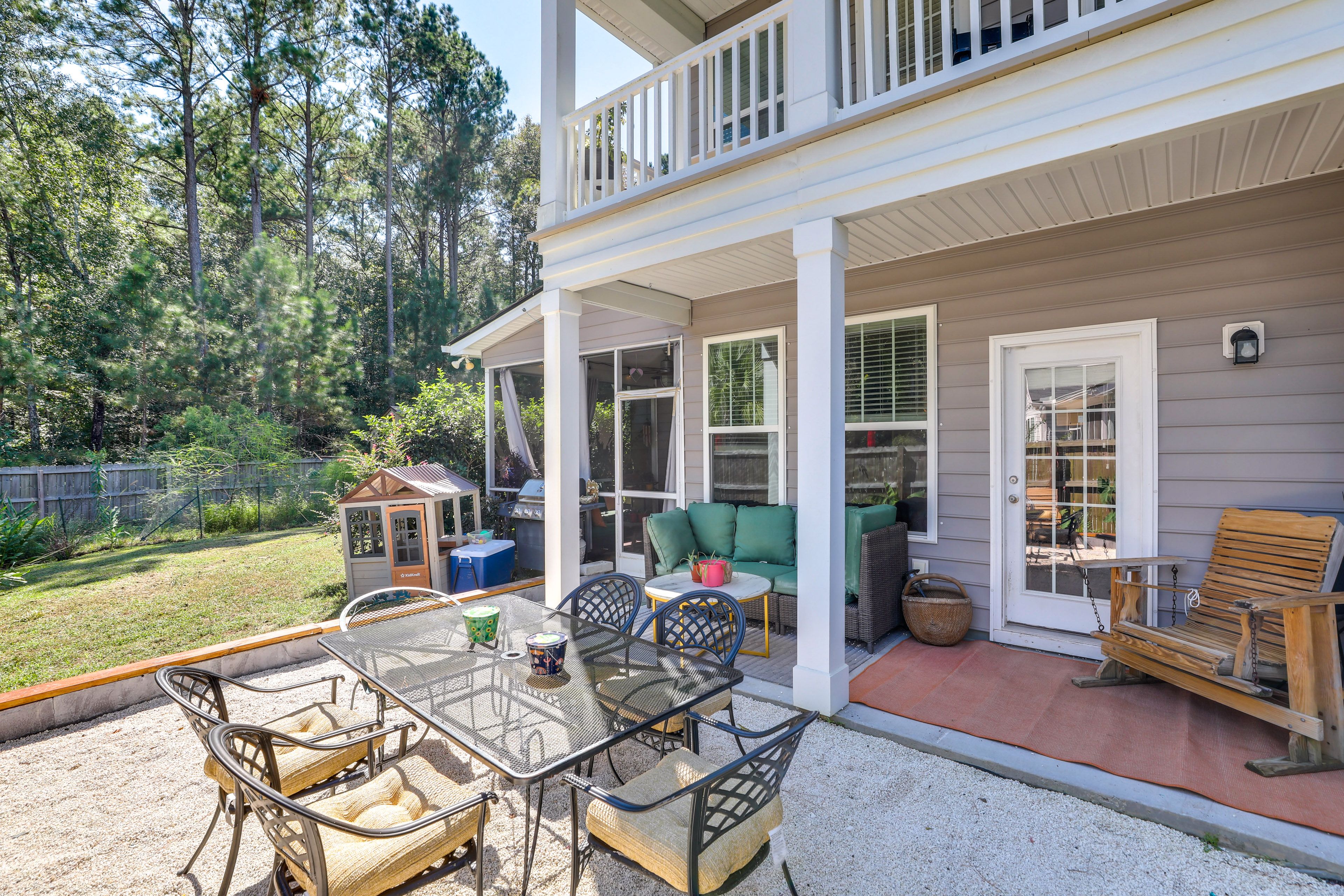 Covered/Gravel Patio | Dining Area | Grill