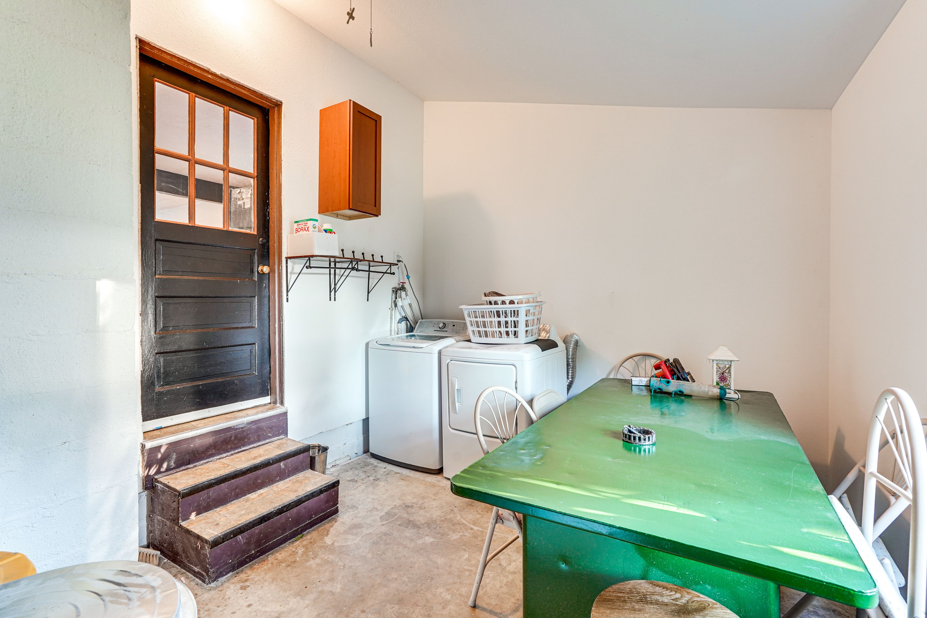 Enclosed Porch | Washer/Dryer | Laundry Detergent | Iron/Board