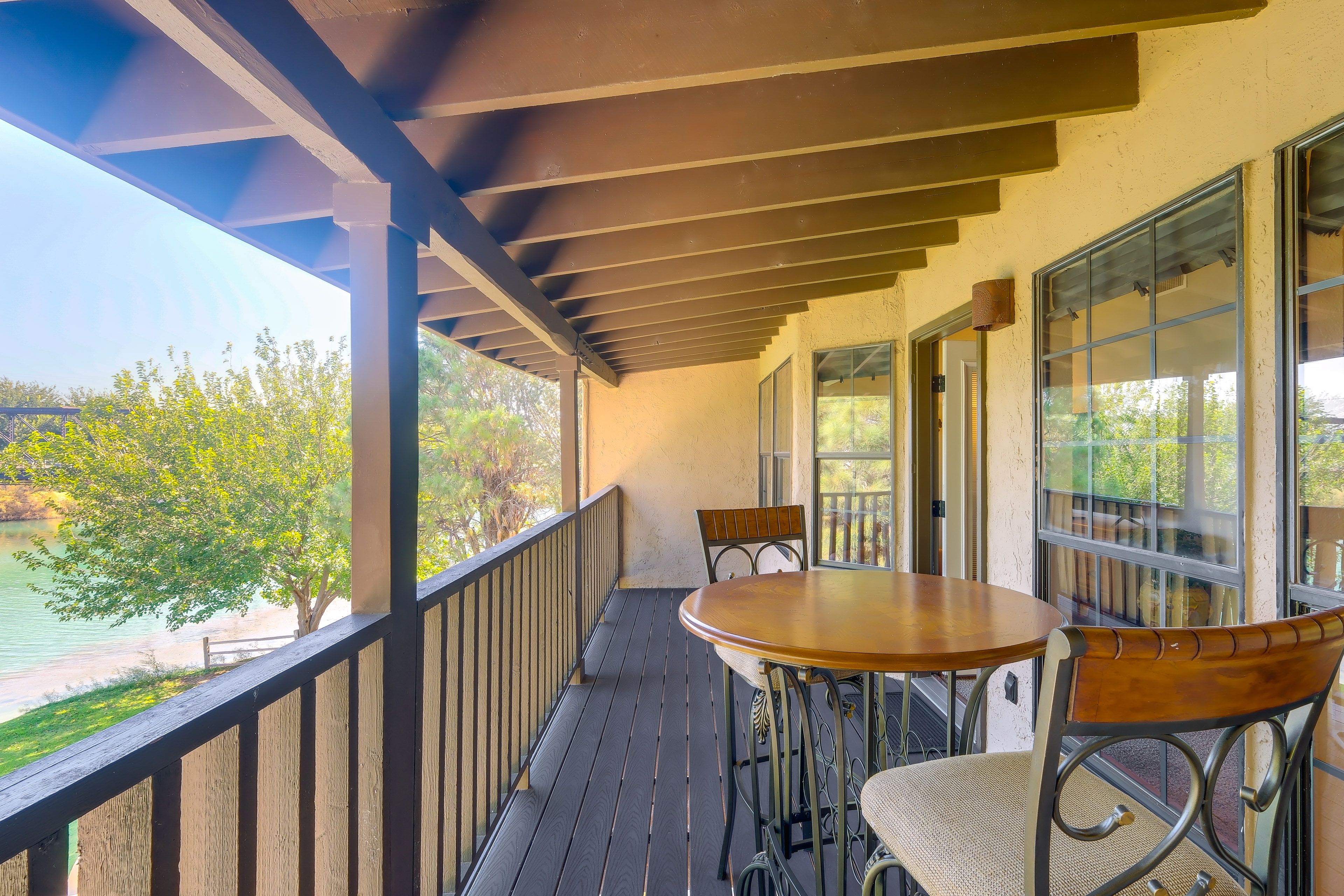 Townhome Exterior | Furnished Balcony | Lake Views