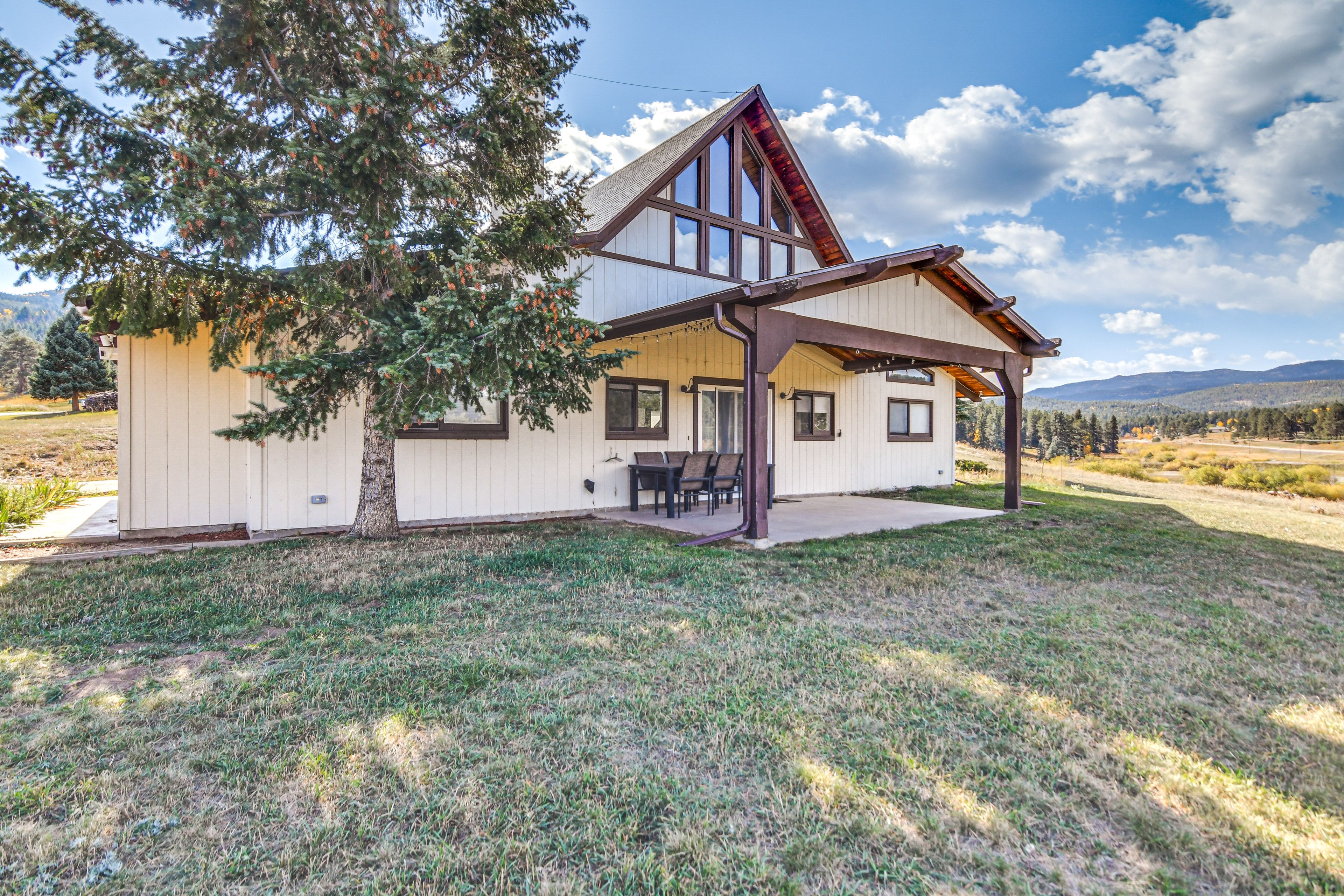 Property Exterior | Mountain Views | Covered Patio