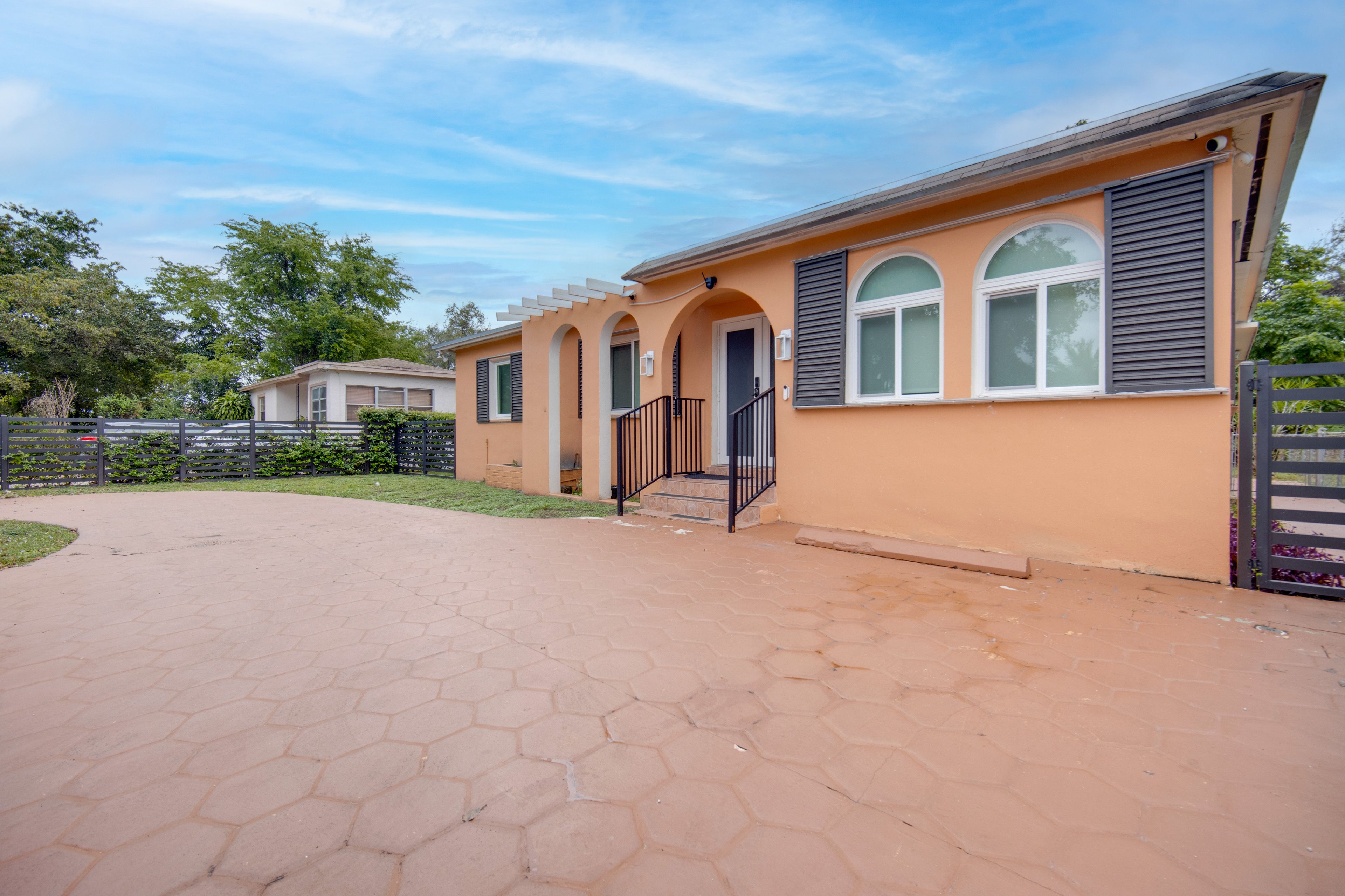 Front Exterior | Fully Fenced Front & Back Yards | Single-Story Home