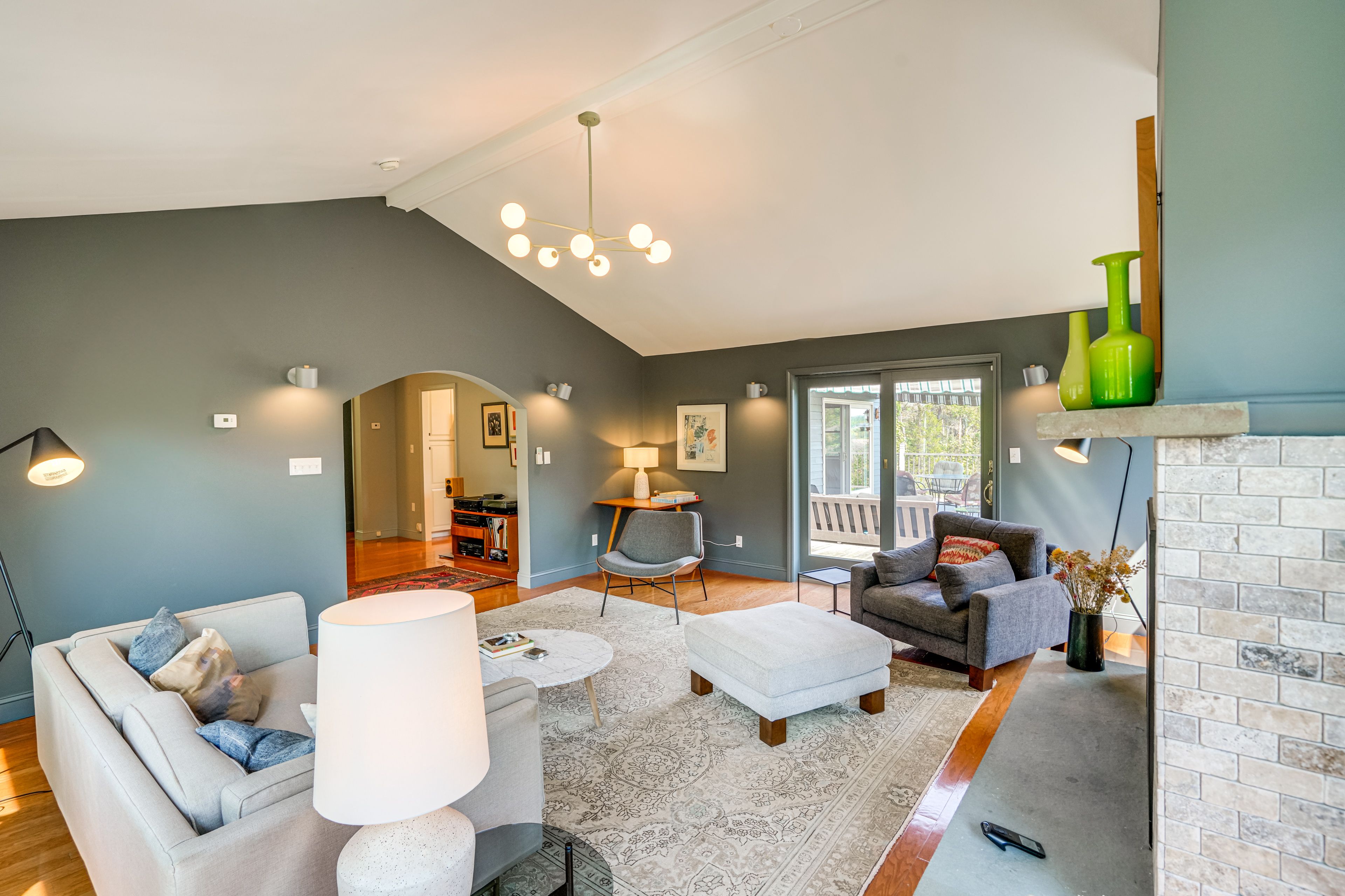 Living Room | Main Level | Gas Fireplace | Deck Access | Central Heating & A/C