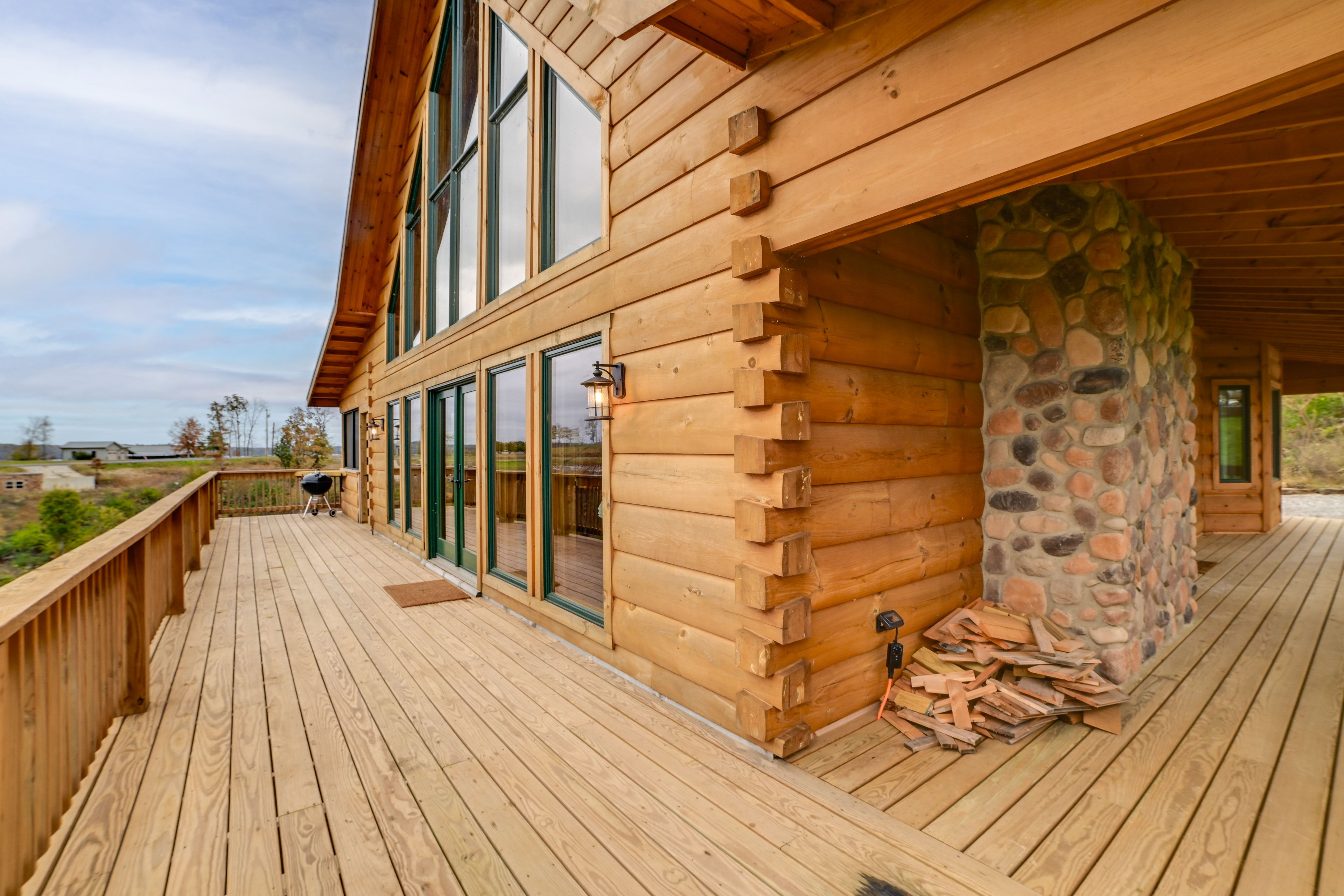 Cabin Exterior | Wraparound Deck | Charcoal Grill