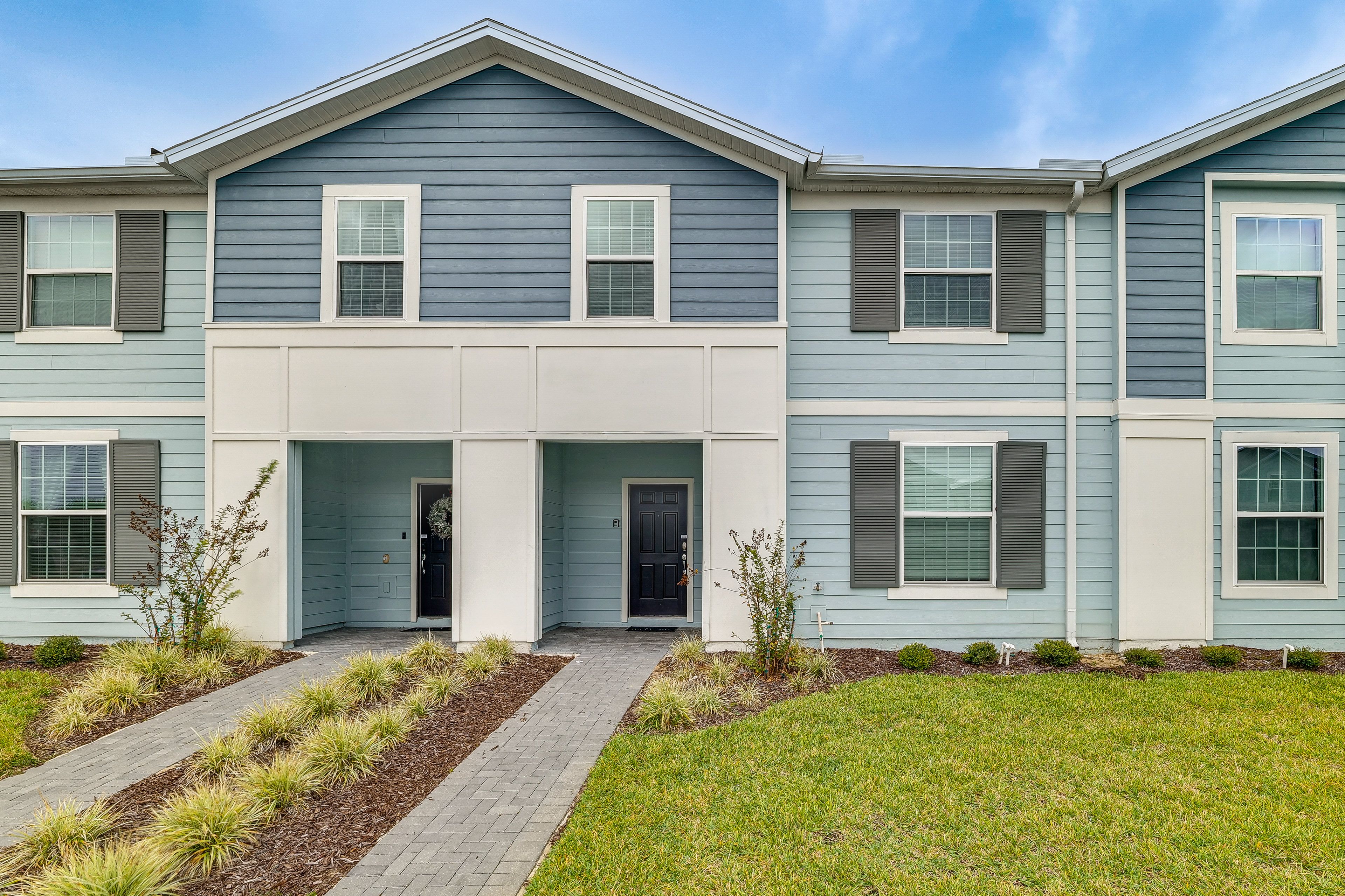 Townhome Exterior | Parking | Carport (3 Vehicles)