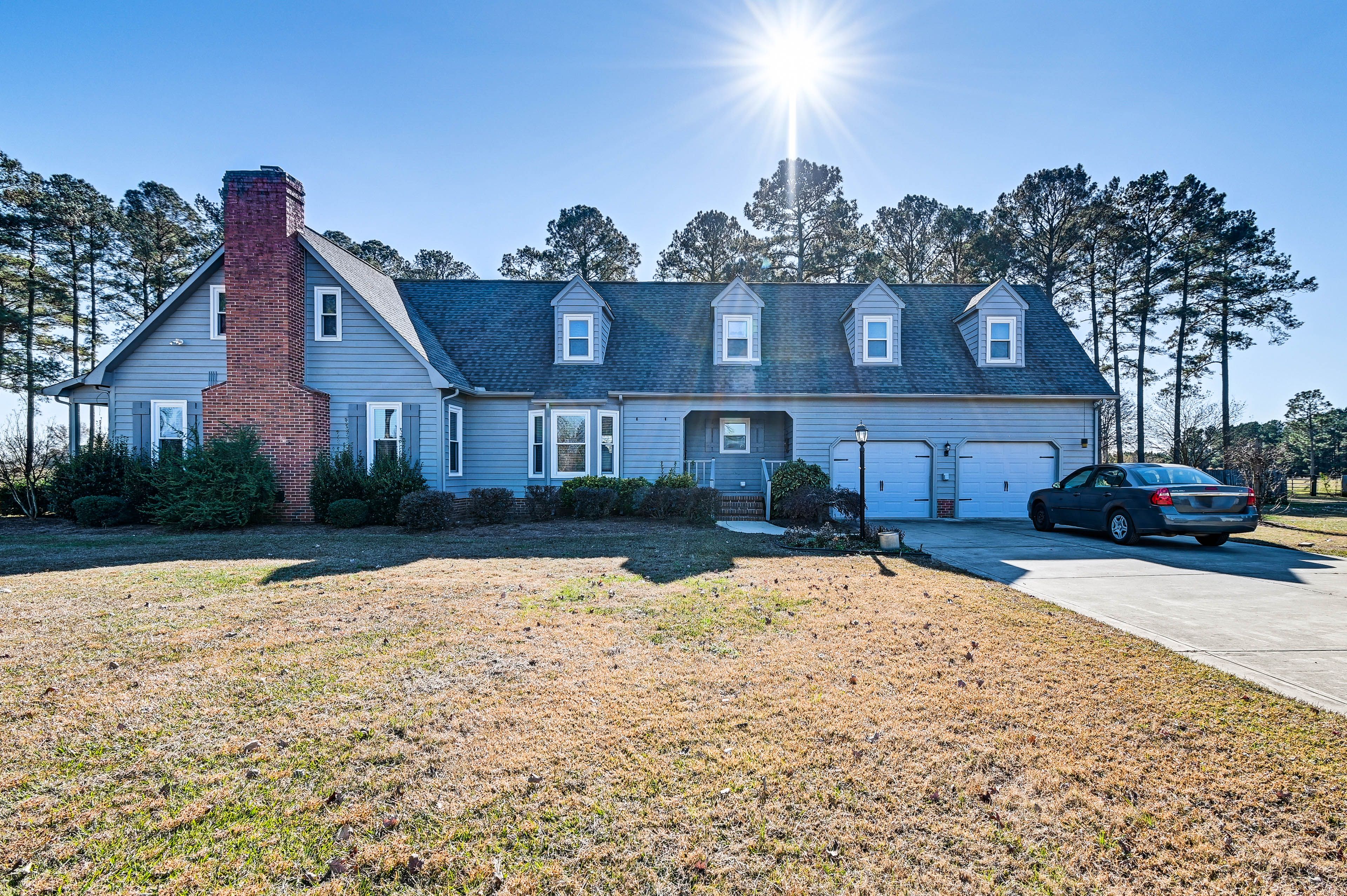 Front Exterior | Parking | Driveway (6 Vehicles)