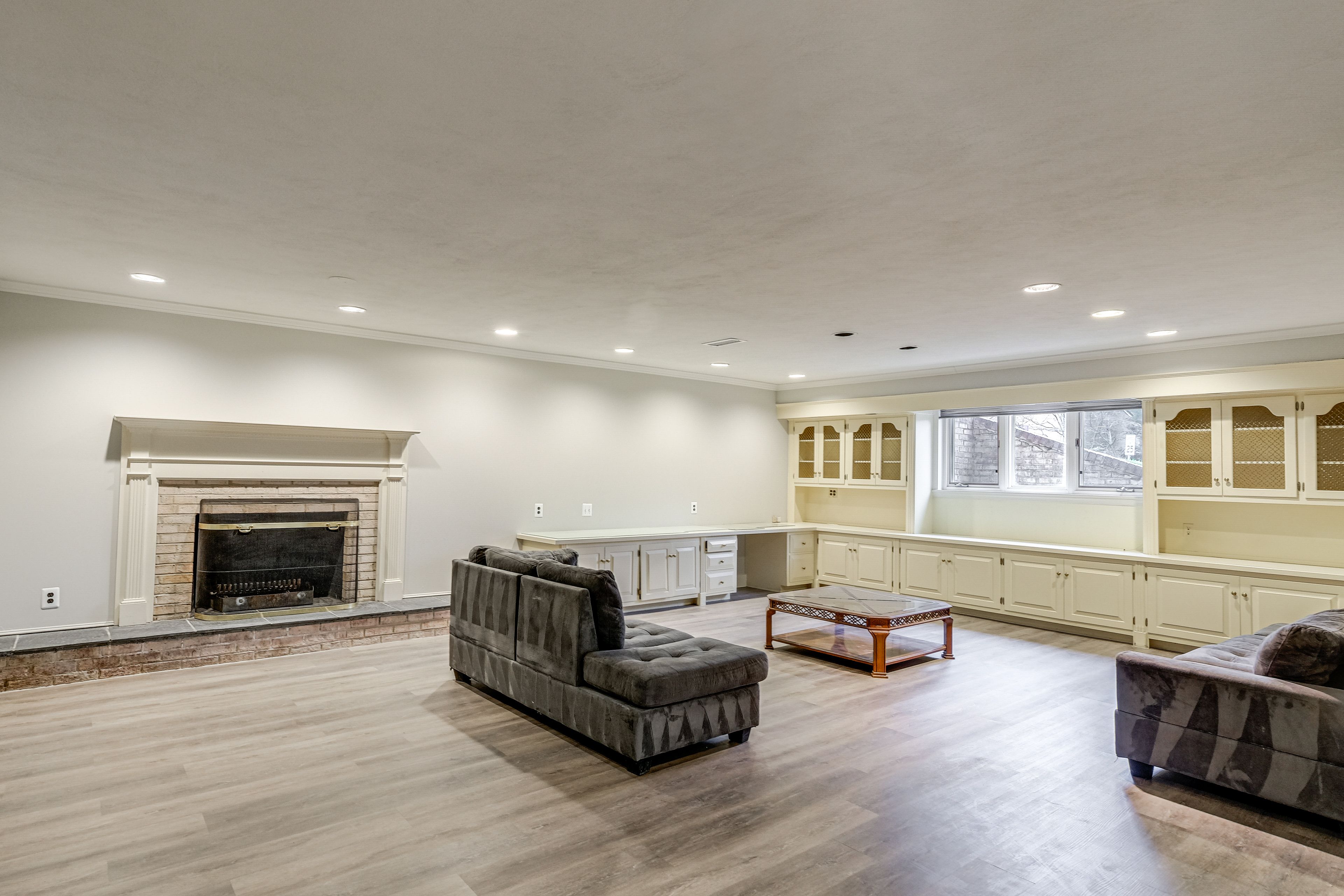 Den | Lower Level | Fireplace