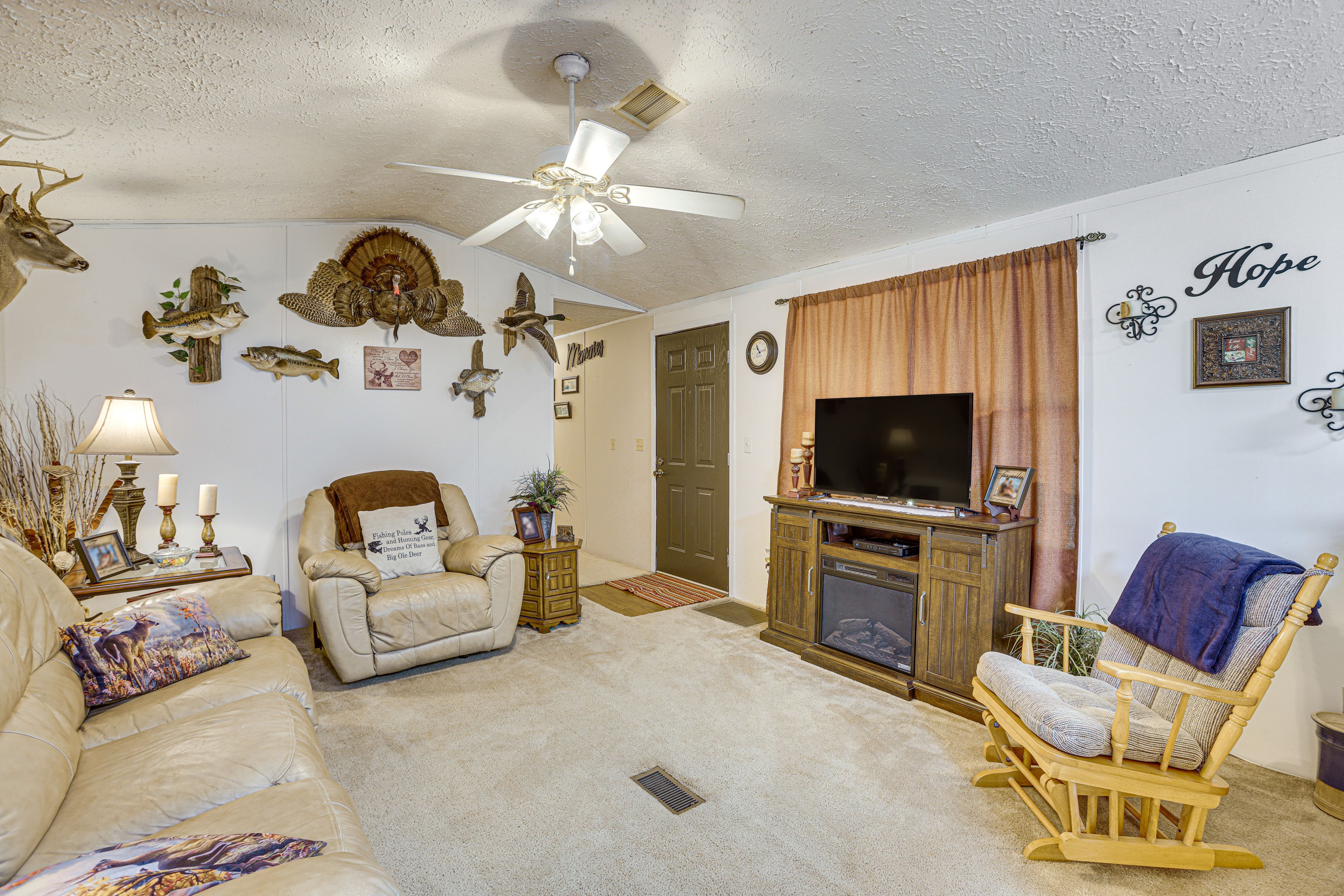 Living Room | Electric Fireplace | Central A/C | Free WiFi