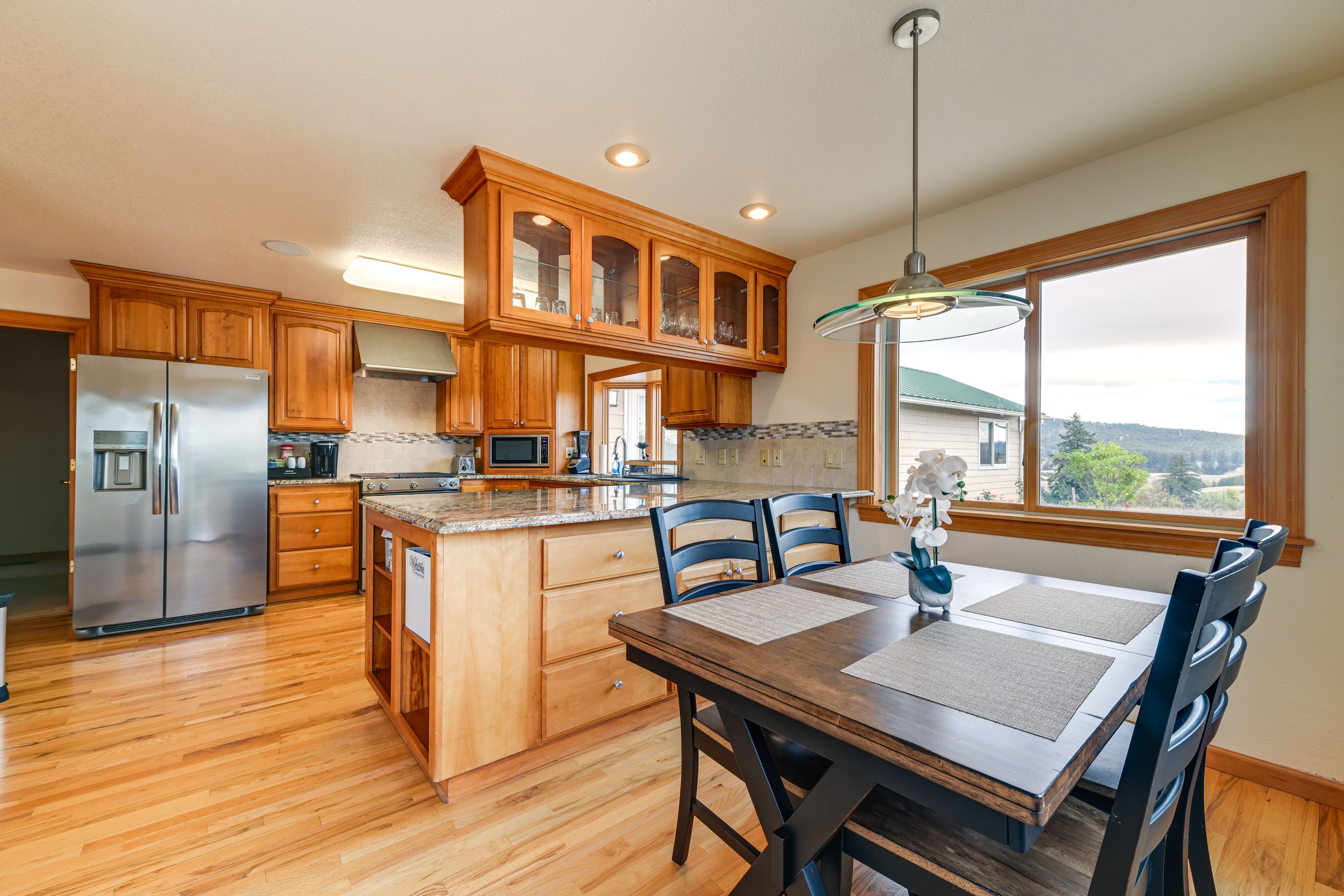 Kitchen & Additional Dining Area | Main Level | Keurig Coffee Maker | Dishwasher