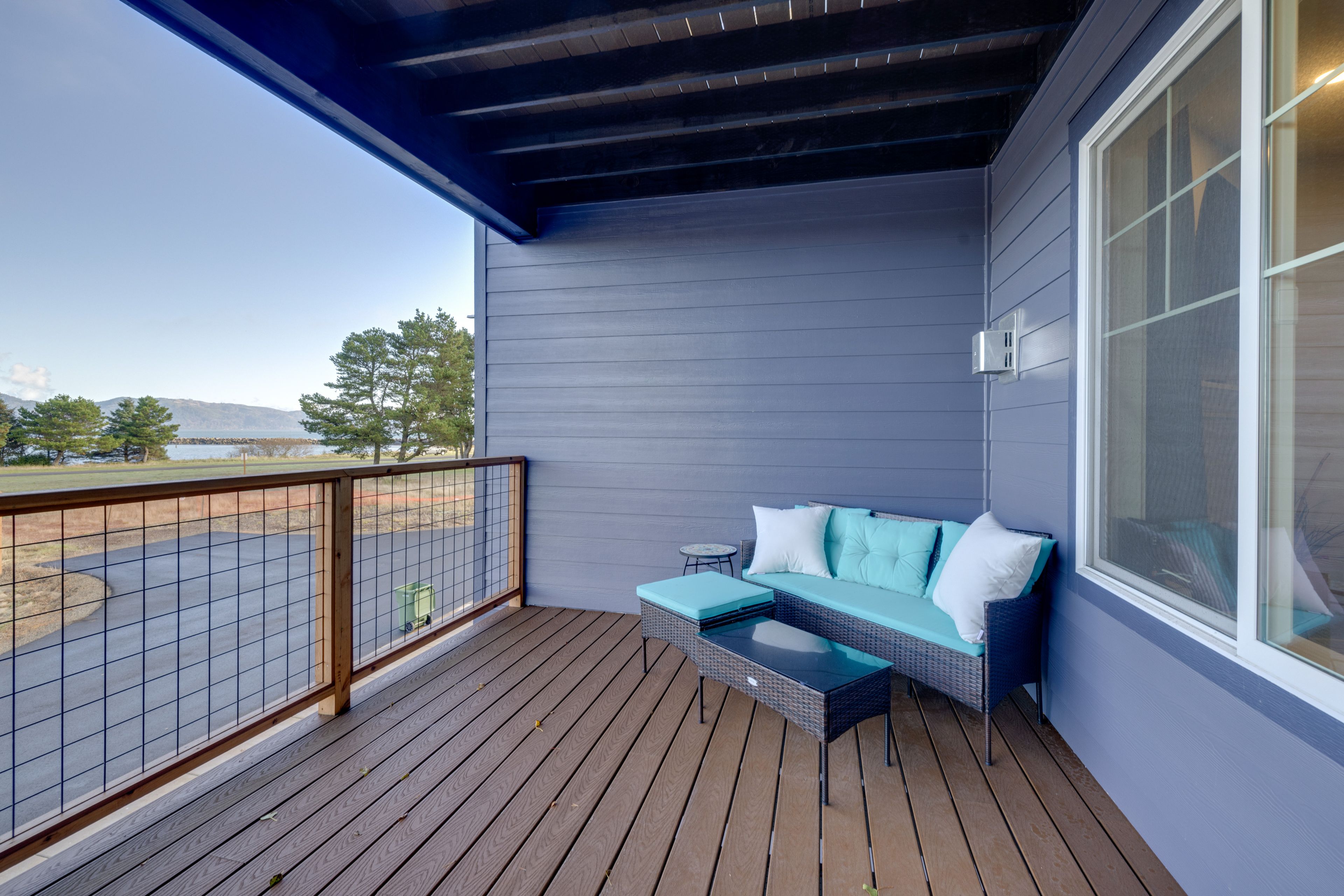Covered Balcony | Outdoor Dining Area | Grill