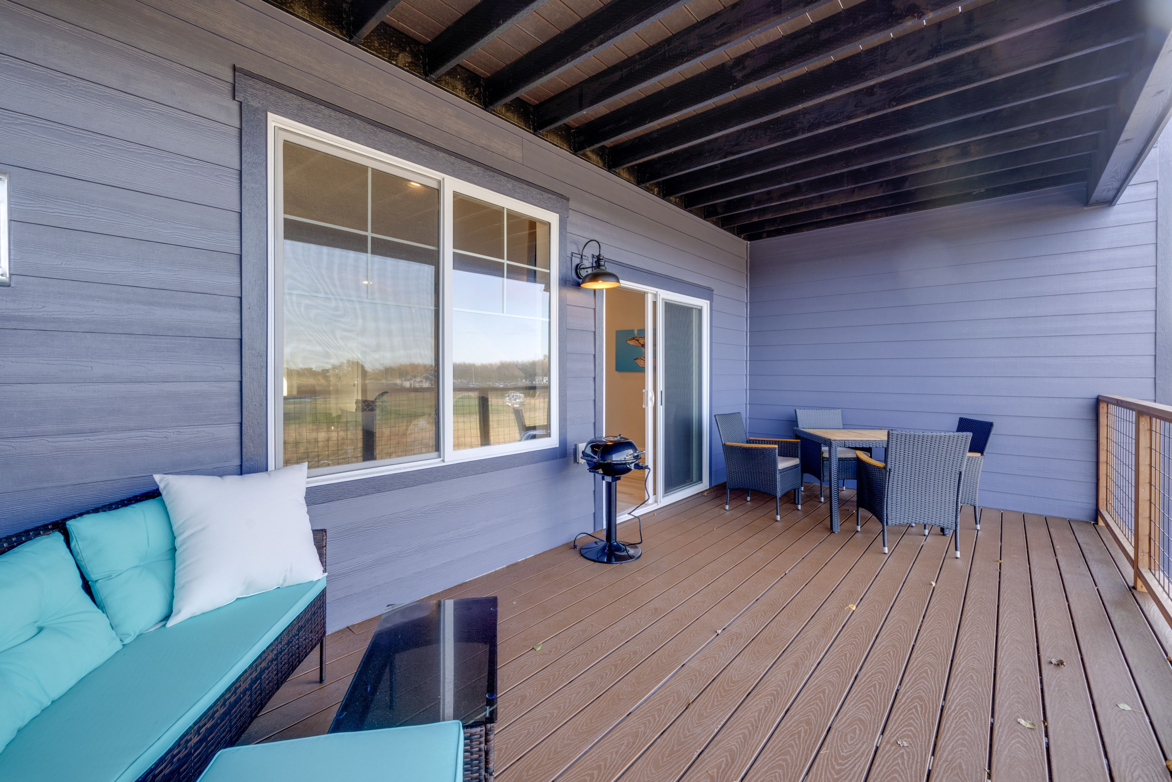 Lower Balcony | Grill | Outdoor Dining Area