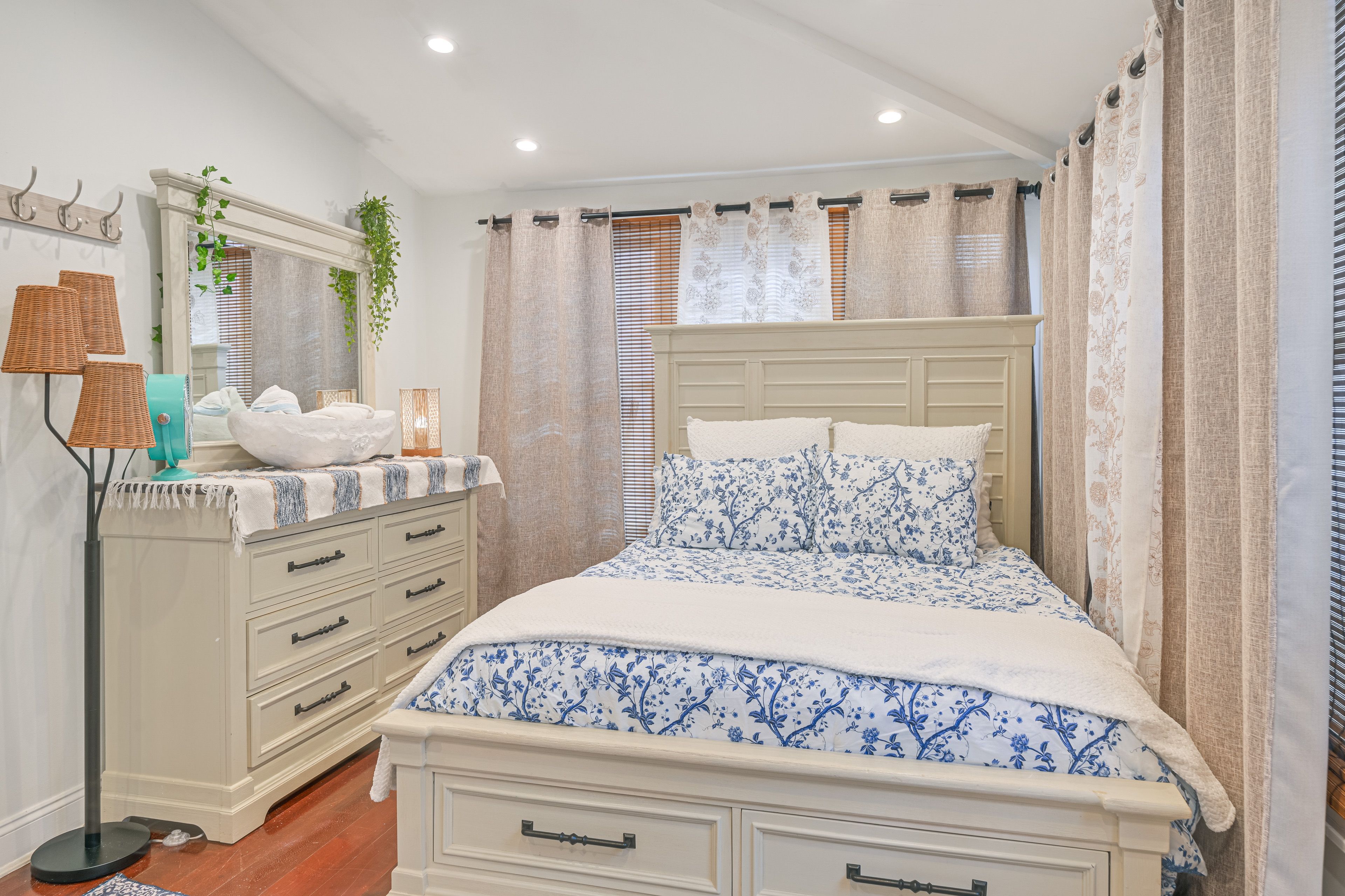 Bedroom 1 | Queen Bed | Flat-Screen TV | Linens Provided | Window A/C Unit